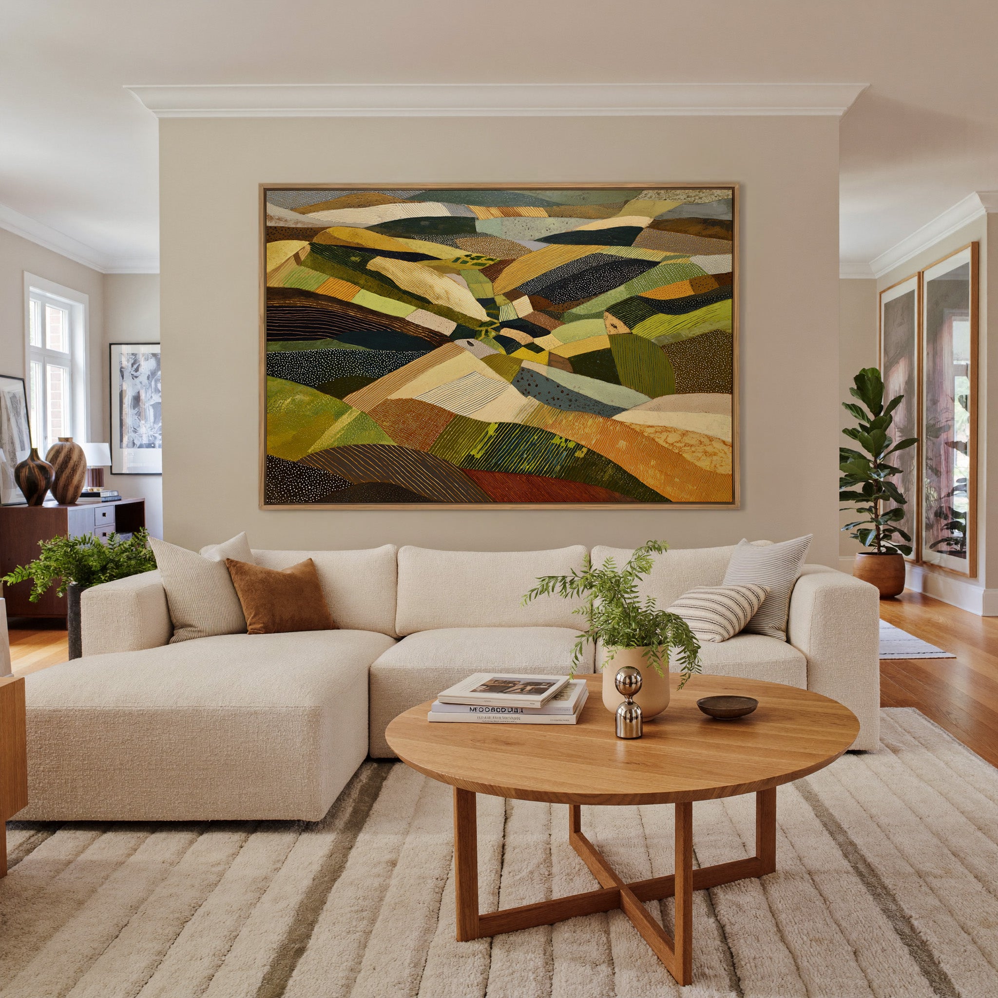 rolling abstract aerial landscape in olive, canvas wall art in an oak frame in a living room