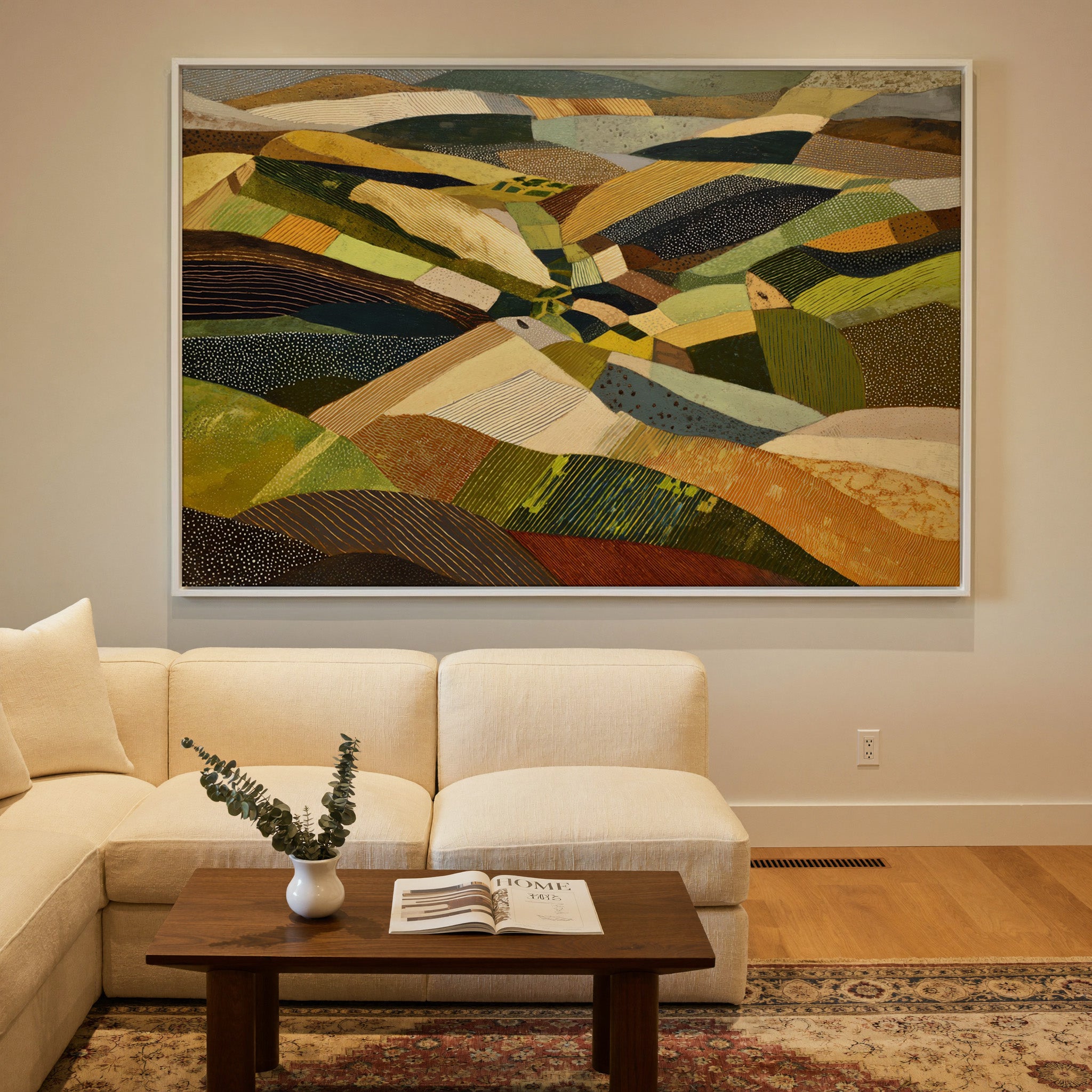 rolling abstract aerial landscape in olive, canvas wall art in a white frame in a styled room setting
