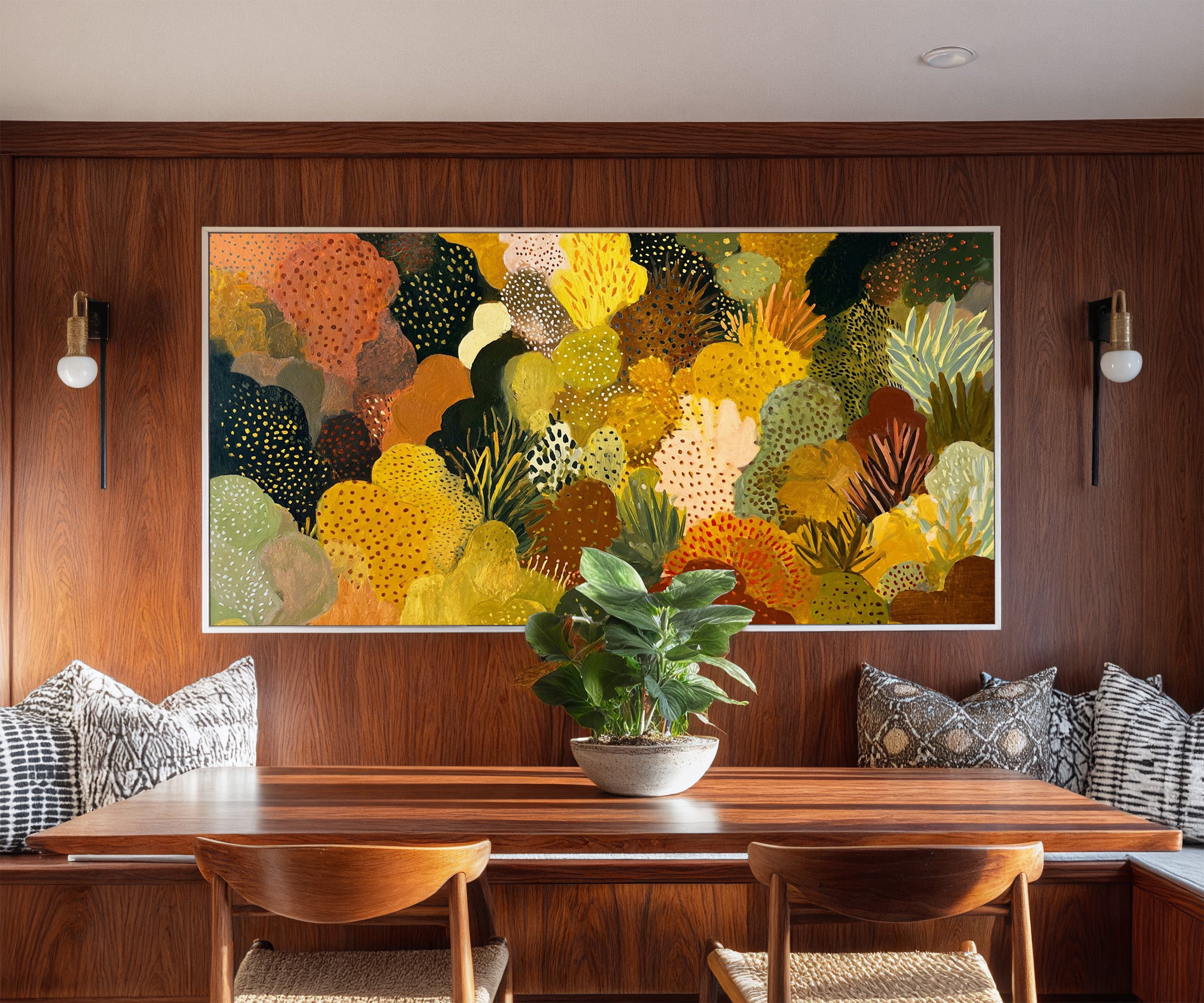 dense ochre and terracotta abstract canvas wall art in a white frame in a styled room setting