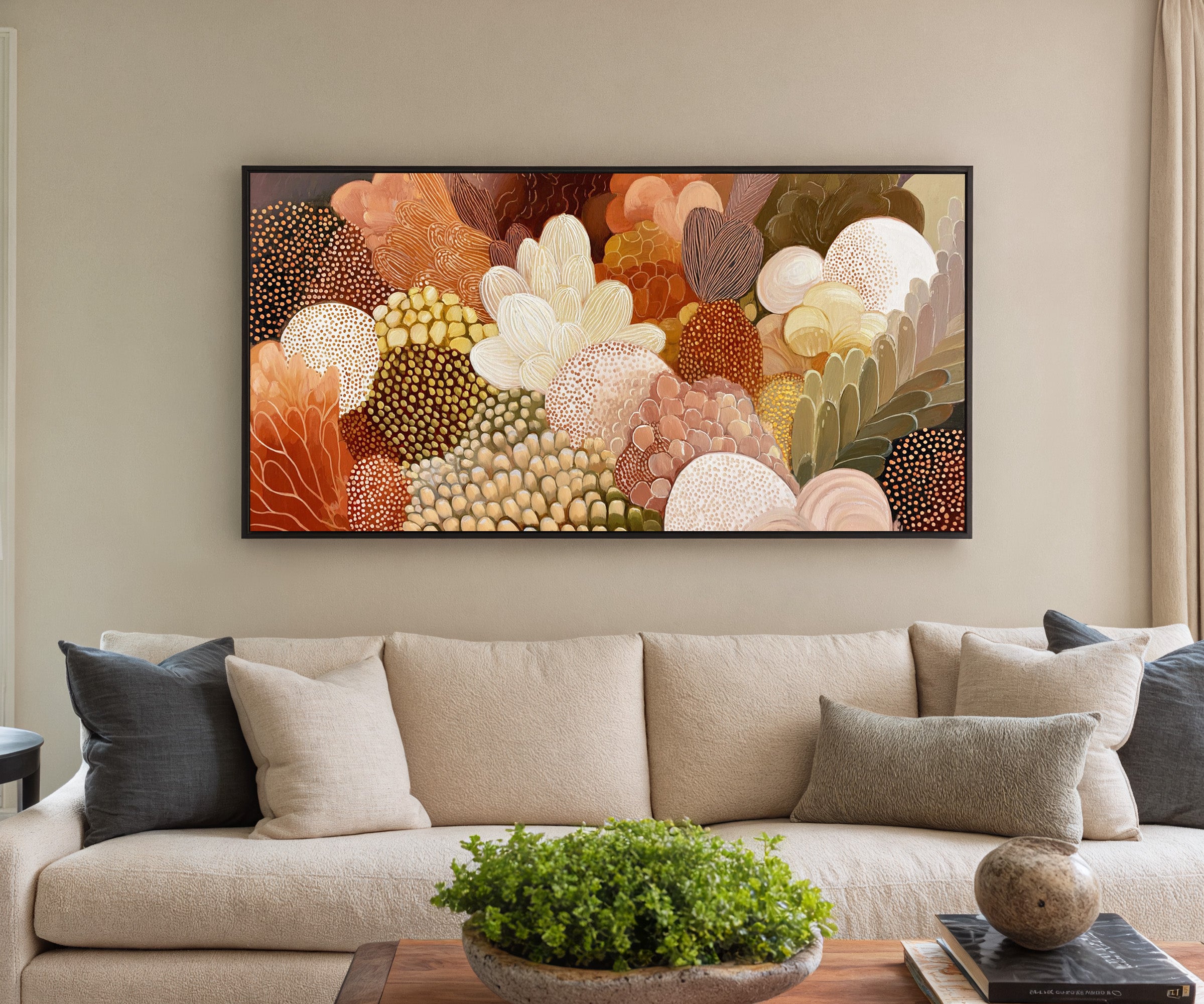 dense layered botanical forms in warm neutrals, canvas wall art in a black frame in a styled room setting