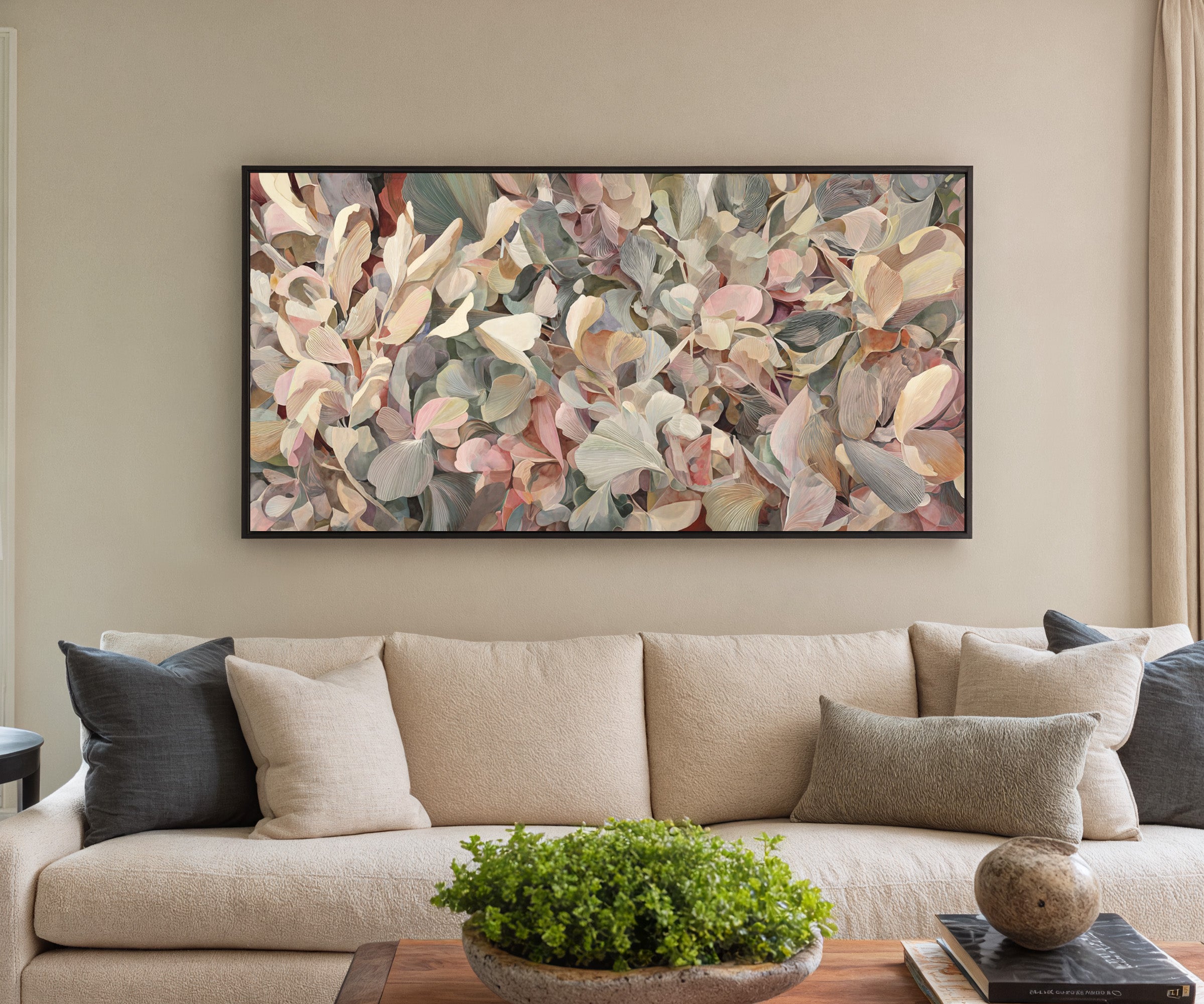 dense rounded petals in blush, cream, sage, and canvas wall art in a black frame in a styled room setting