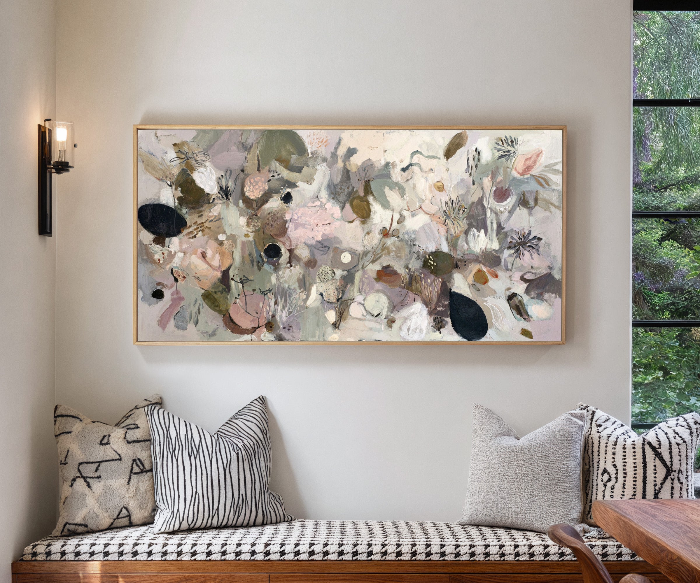 neutral abstract with moss green, taupe, beige, canvas wall art in a natural wood frame in a living room