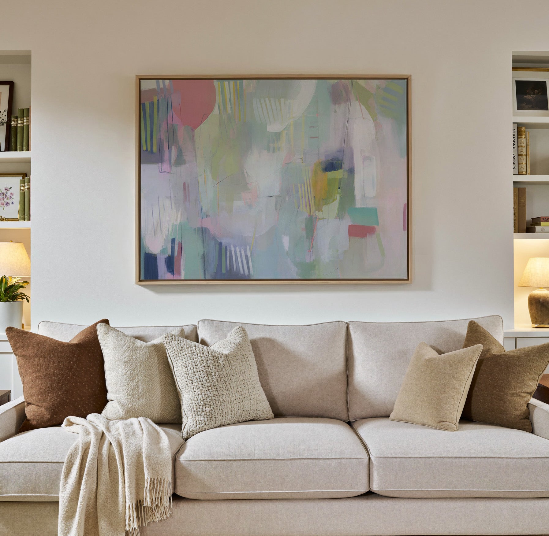 pastel abstract with vertical marks canvas wall art in a natural wood frame in a styled room setting
