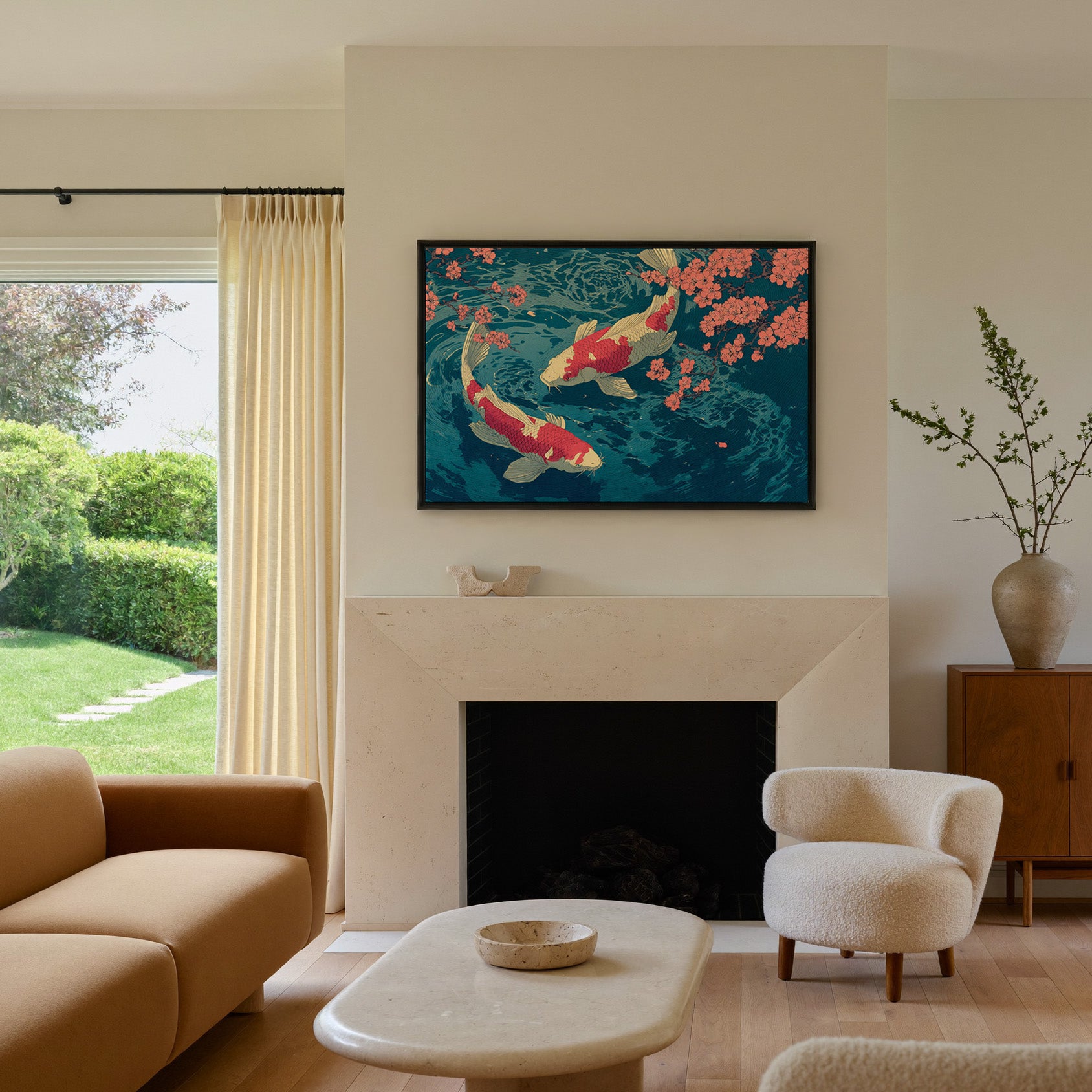red and cream koi beneath coral blossoms over canvas wall art in a black frame above a mantel
