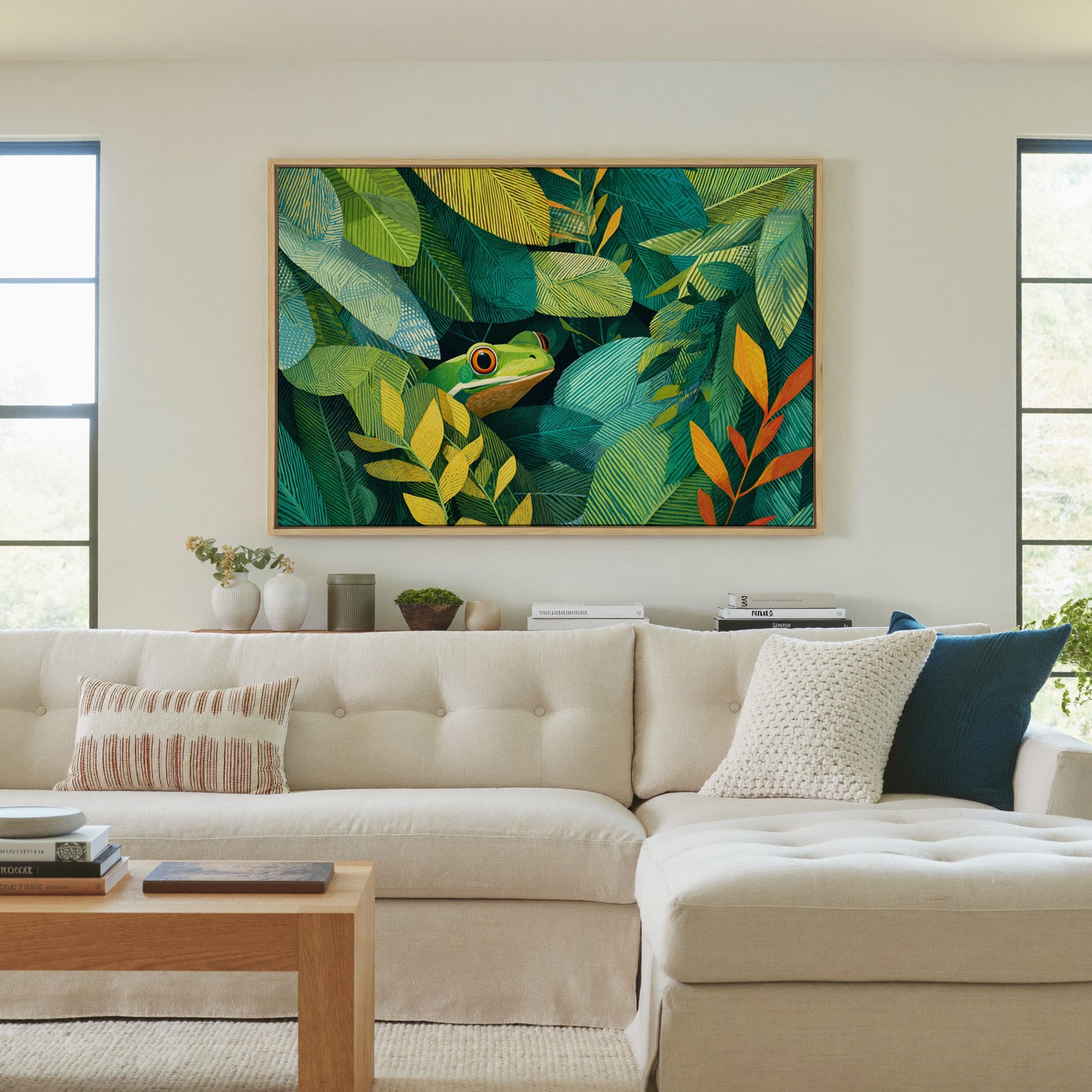 green frog among layered tropical leaves canvas wall art in a natural wood frame in a living room