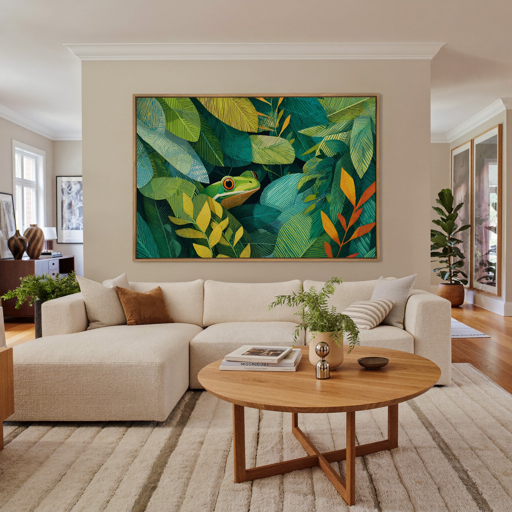 green frog among layered tropical leaves canvas wall art in an oak frame in a living room