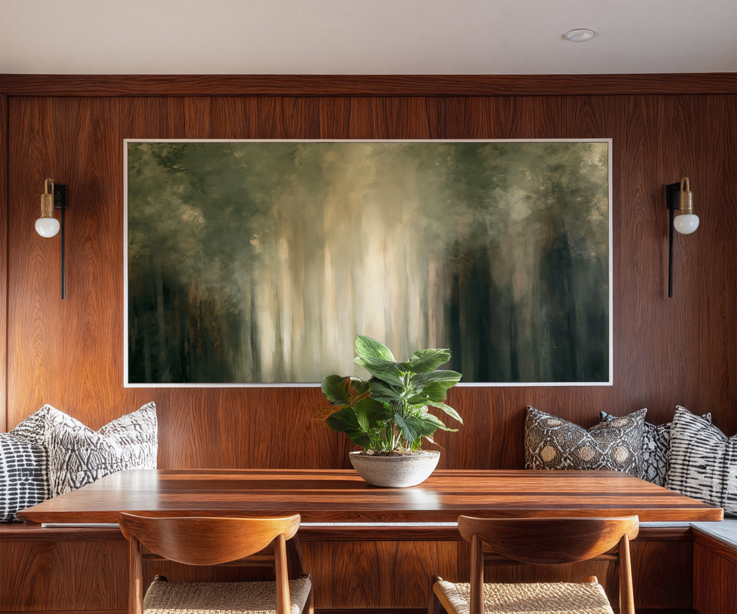 soft green and cream abstract forest with canvas wall art in a white frame in a styled room setting