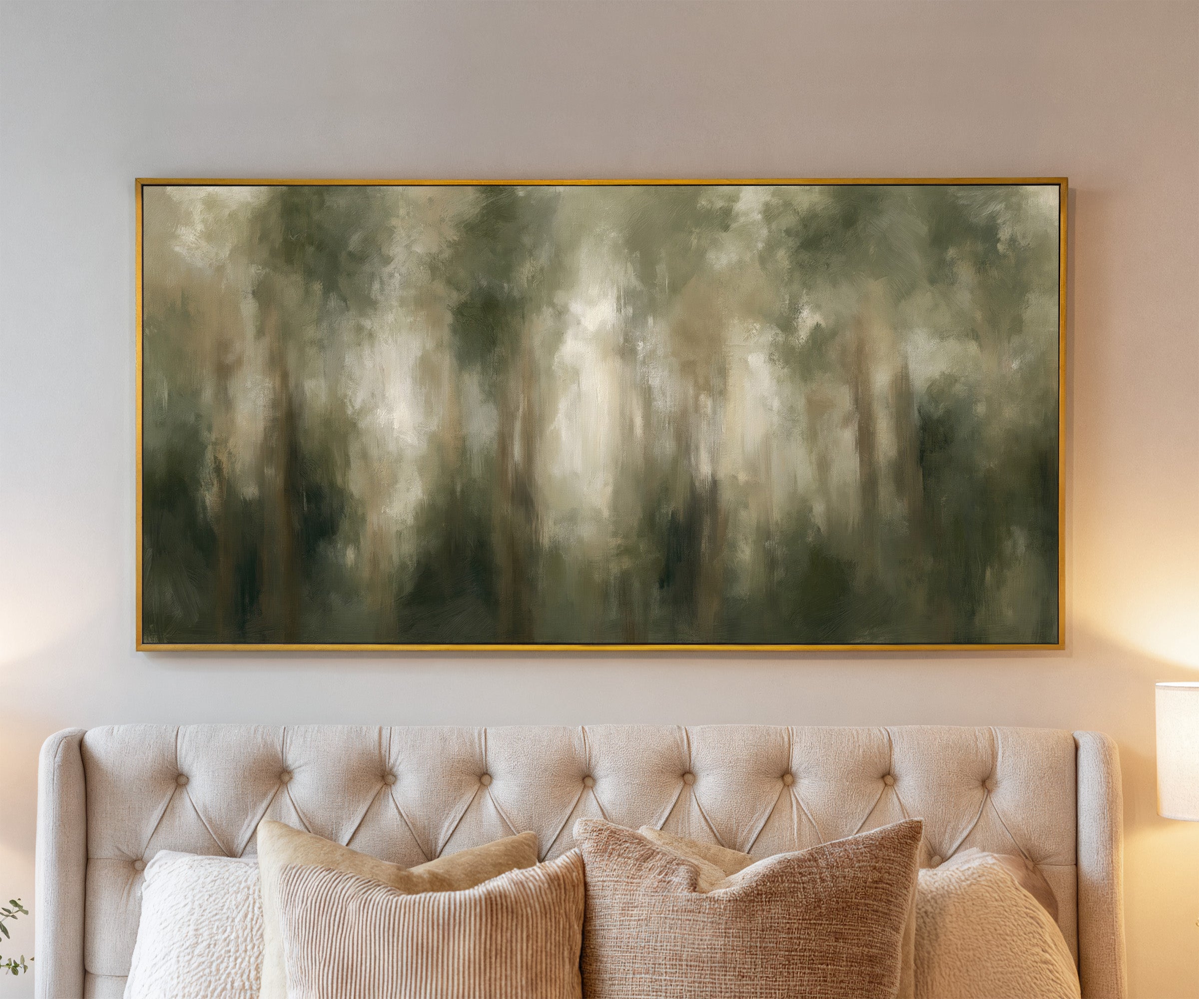 soft green and beige abstract forest canvas wall art in a gold frame above a bed