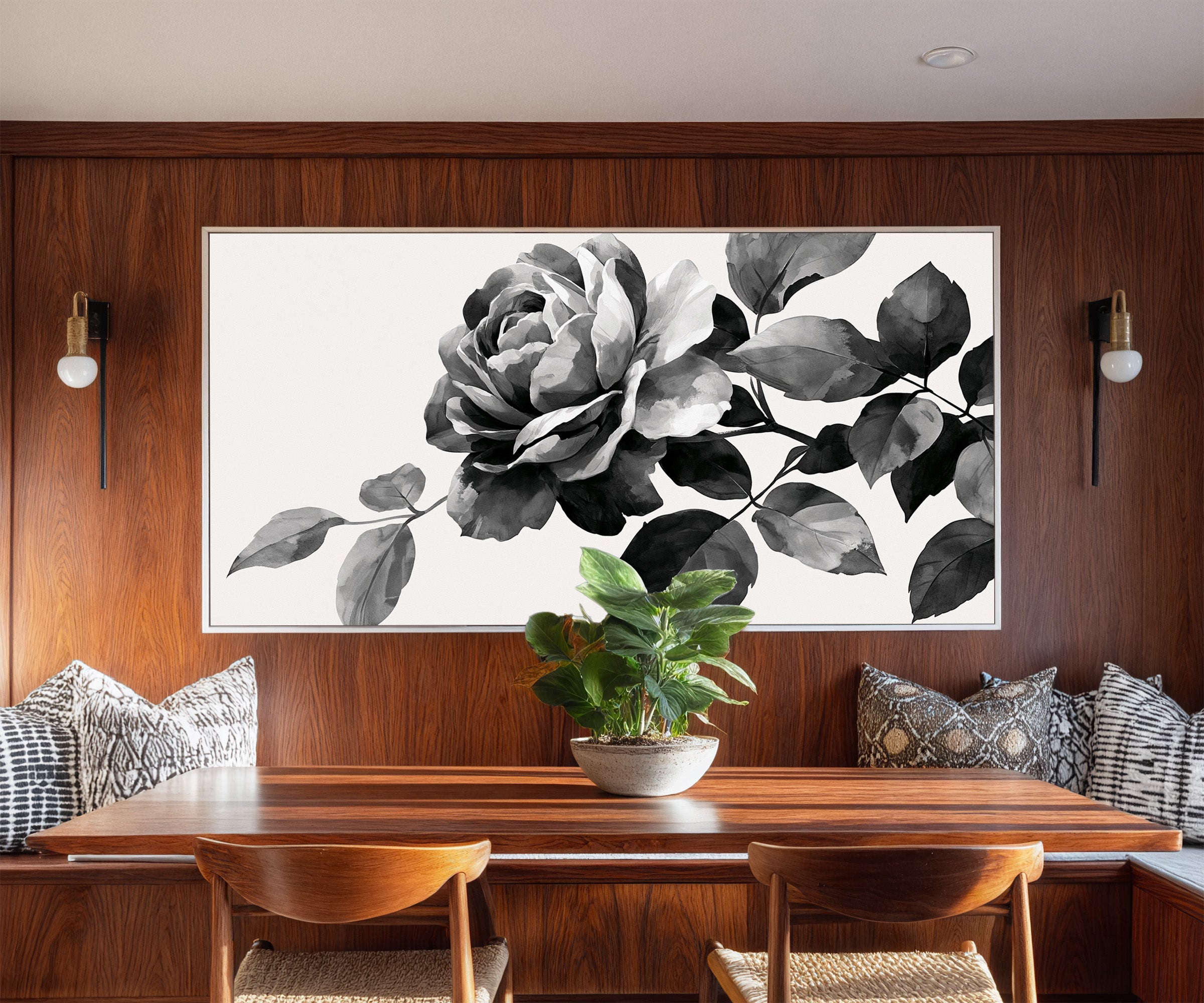 black and white floral branch canvas wall art in a white frame in a styled room setting