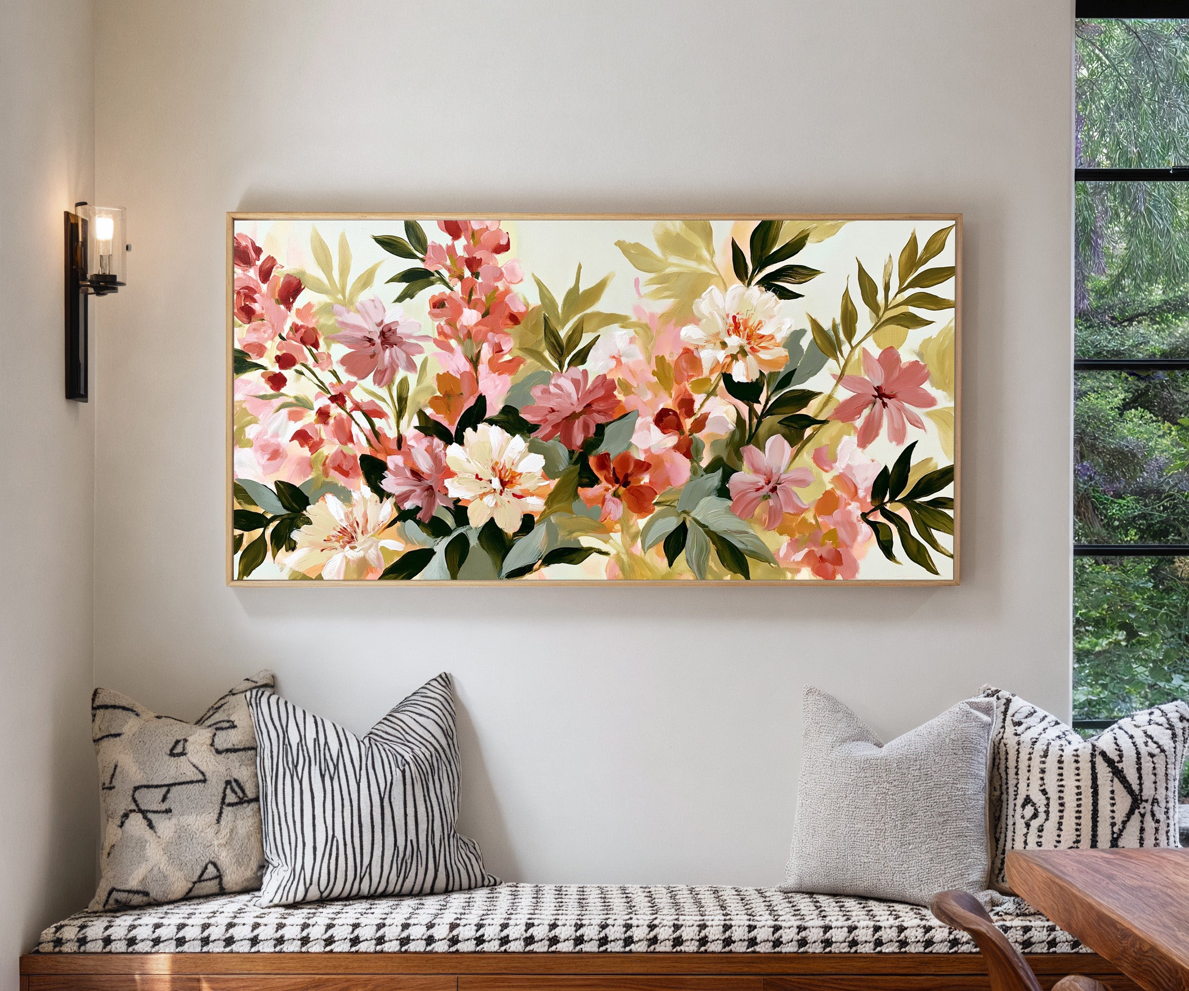 soft pink, cream, and olive floral forms canvas wall art in a natural wood frame in a living room