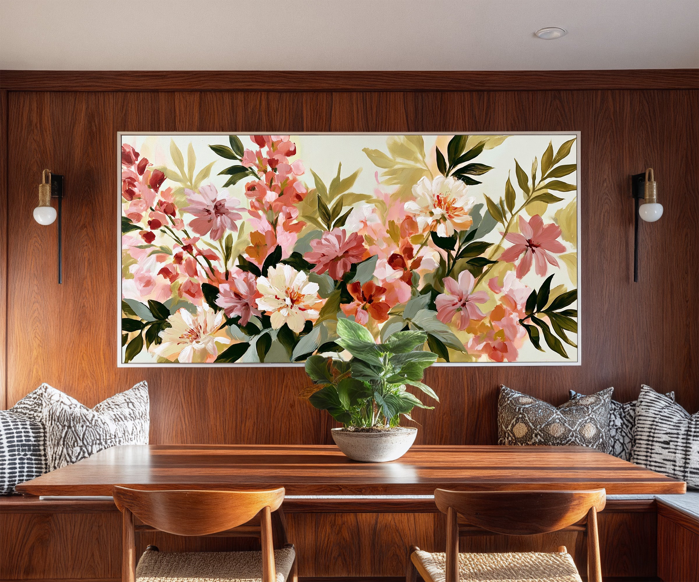 soft pink, cream, and olive floral forms canvas wall art in a white frame in a styled room setting