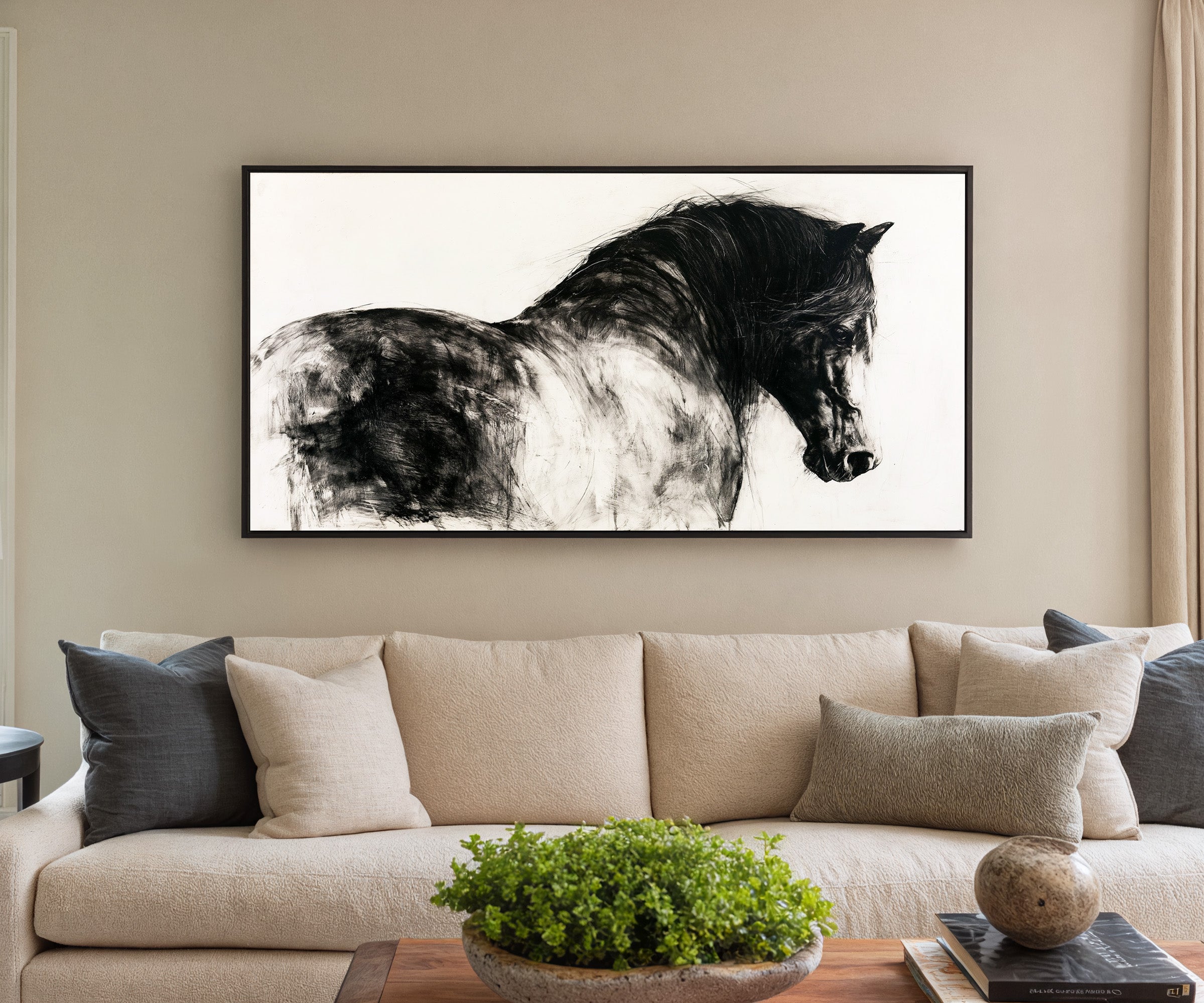 black and white close cropped horse portrait canvas wall art in a black frame in a styled room setting