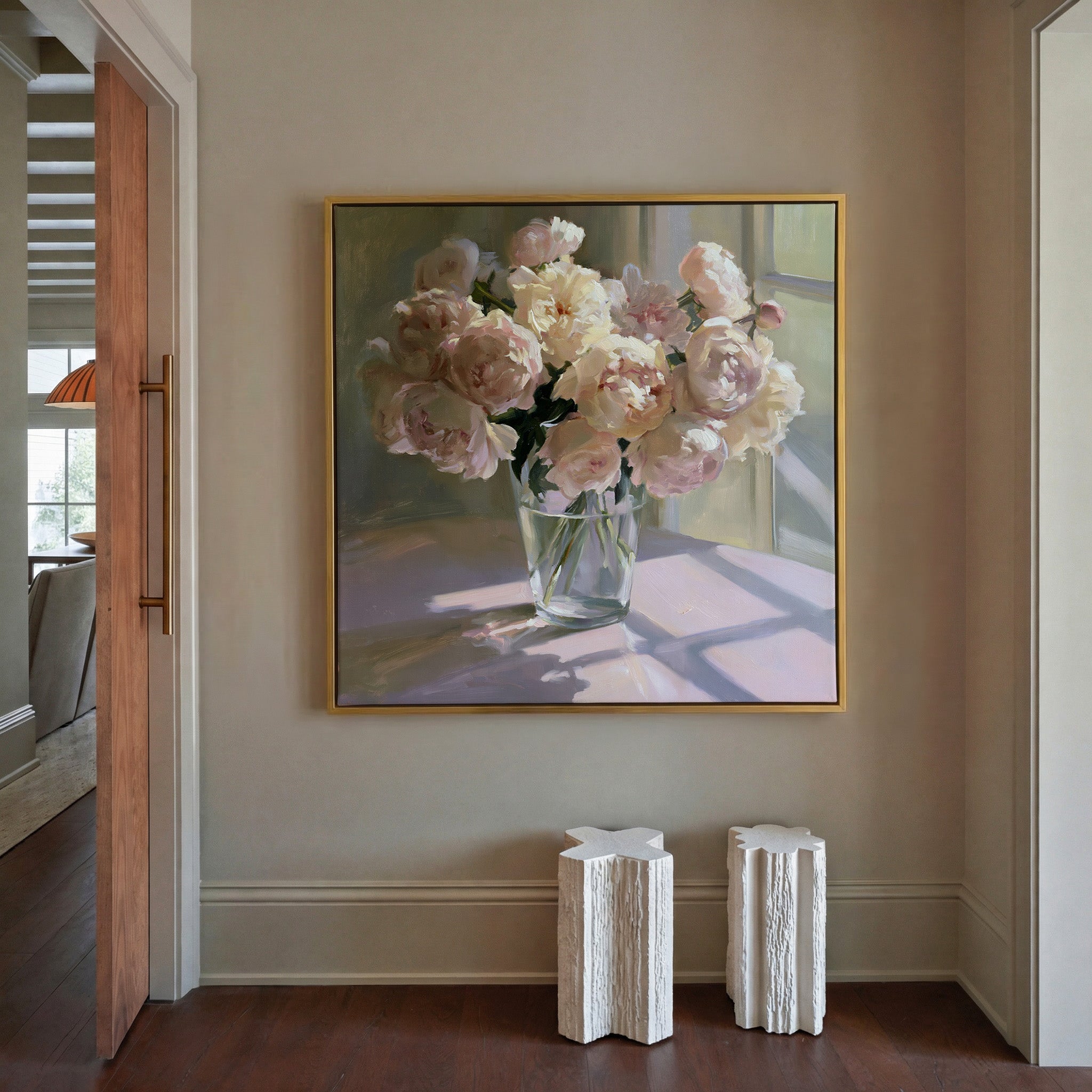 soft blush and cream peony bouquet in a glass canvas wall art in a gold frame in a styled room setting