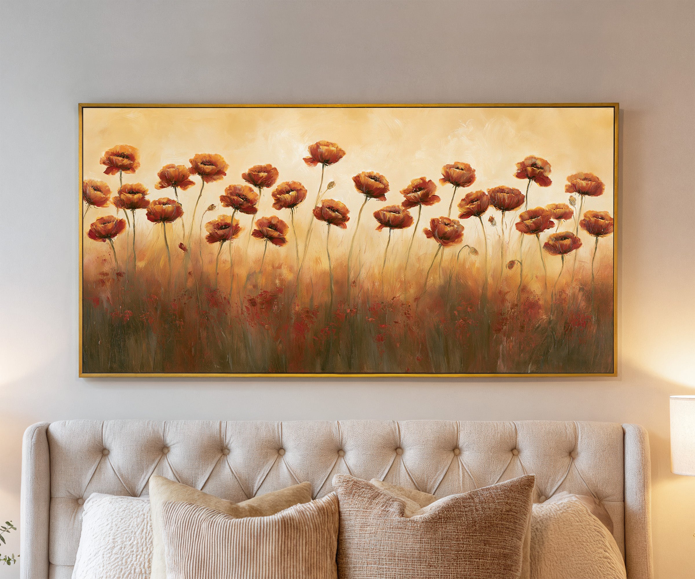 burnt orange poppy field canvas wall art in a gold frame above a bed, with clear frame and room context