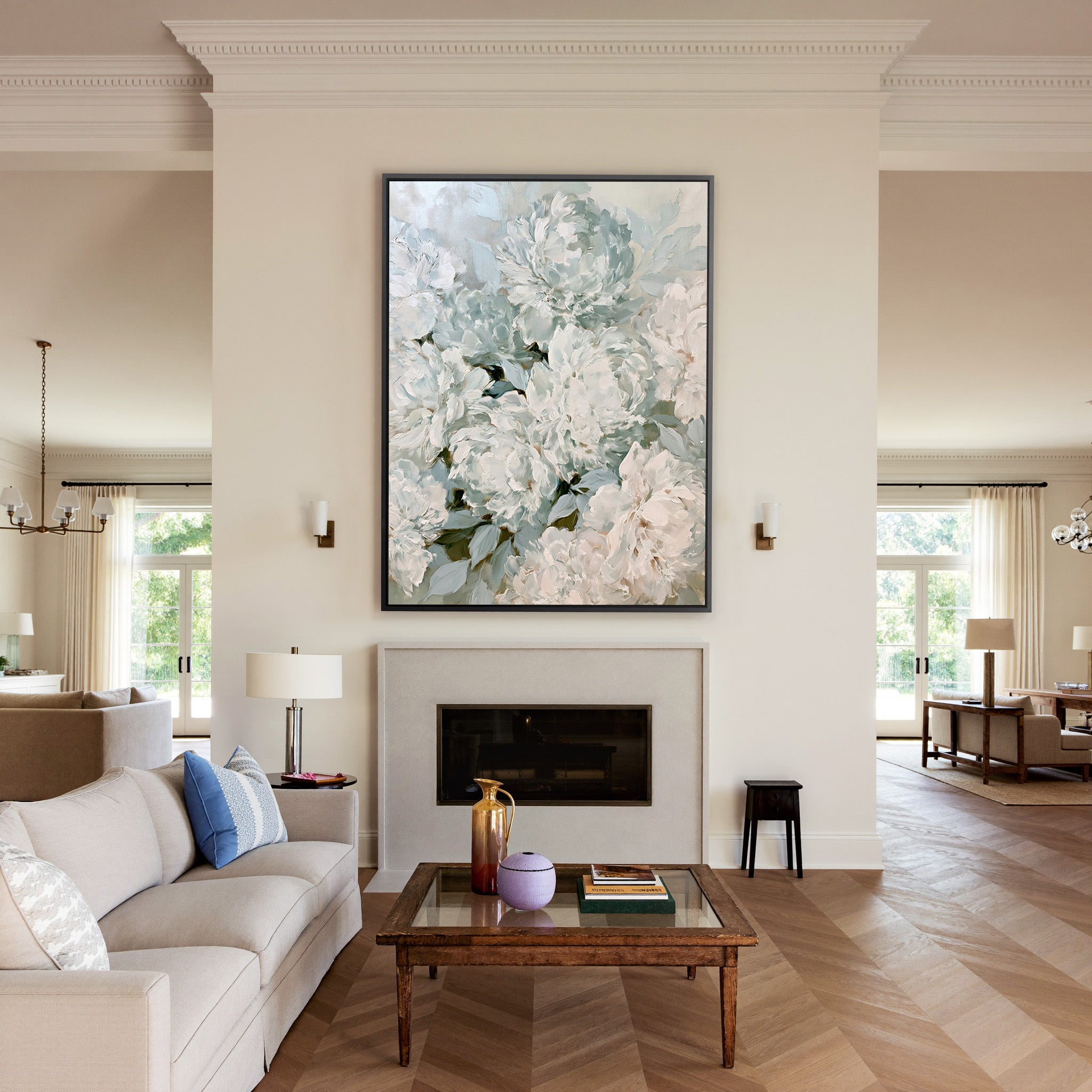 soft white and blush peony bouquet canvas wall art in a black frame above a mantel