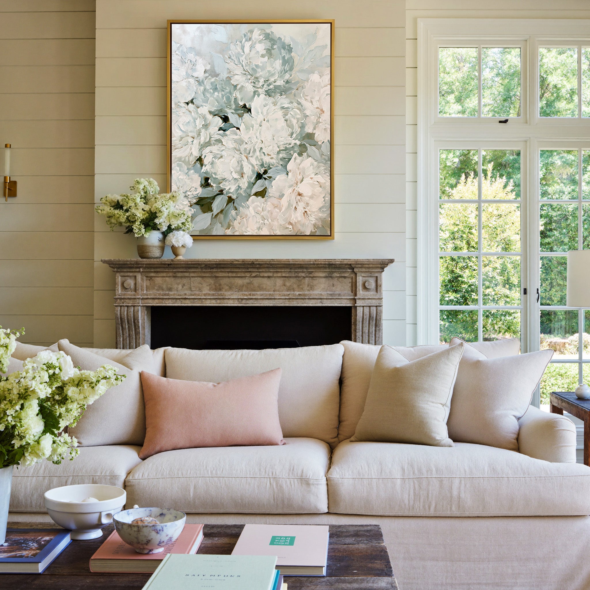 soft white and blush peony bouquet canvas wall art in a gold frame above a mantel