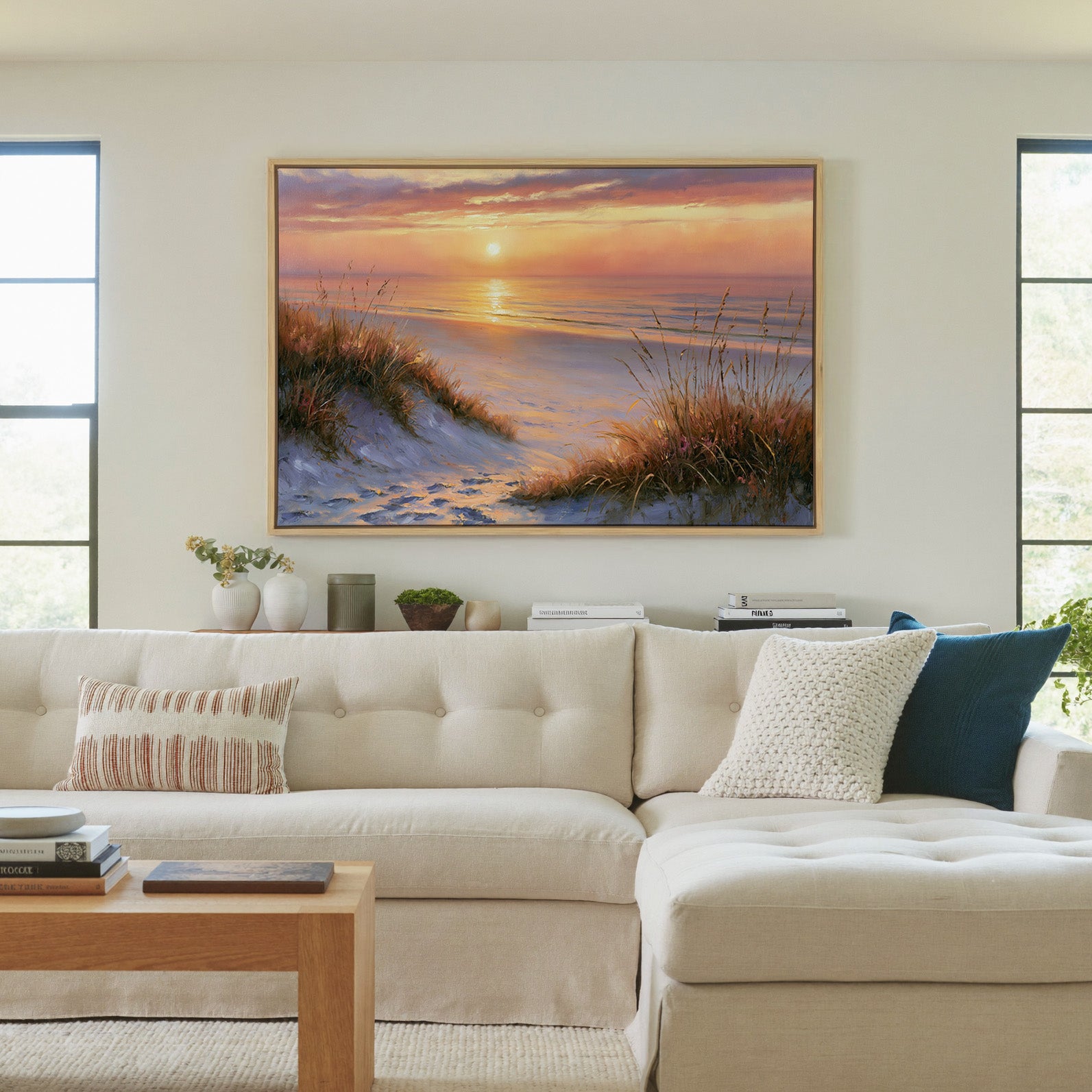 golden hour beach with dune grass and a calm sea canvas wall art in a natural wood frame in a living room