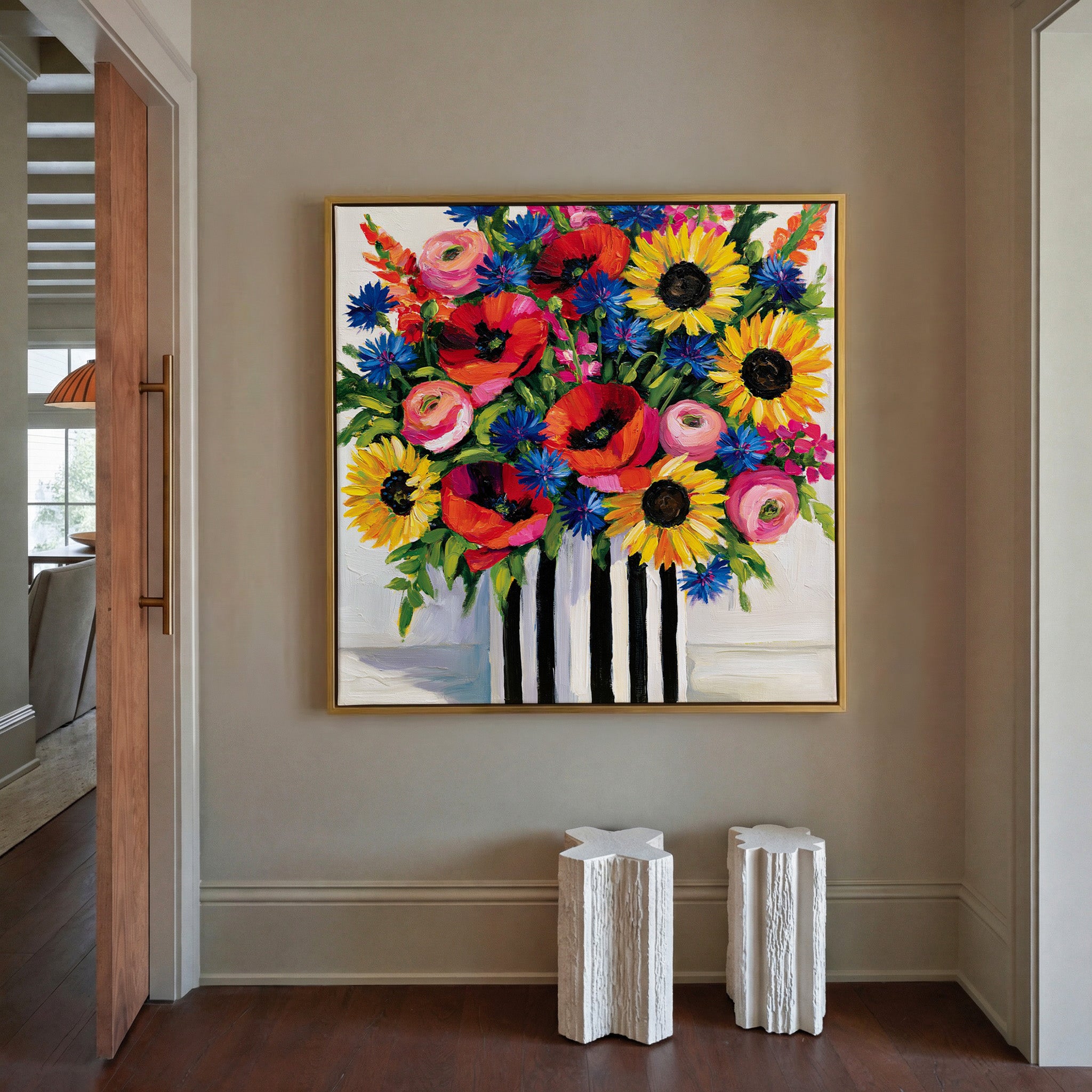 bright wildflower bouquet with poppies, canvas wall art in a gold frame in a styled room setting