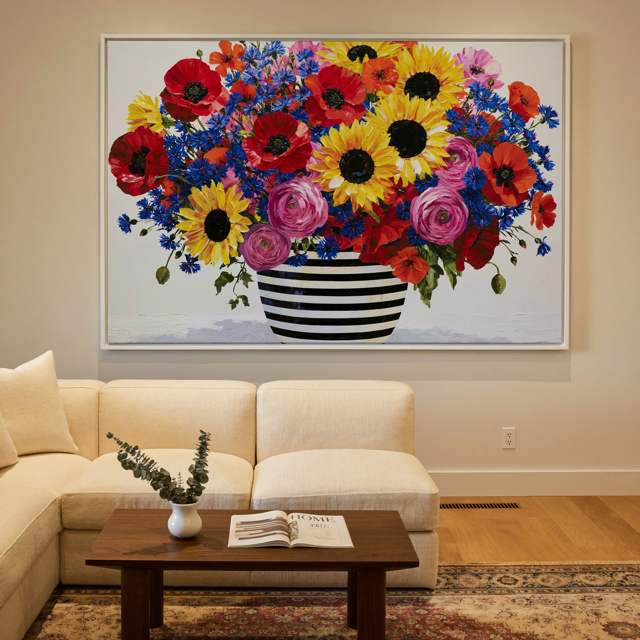 colorful bouquet with striped vase canvas wall art in a white frame in a styled room setting