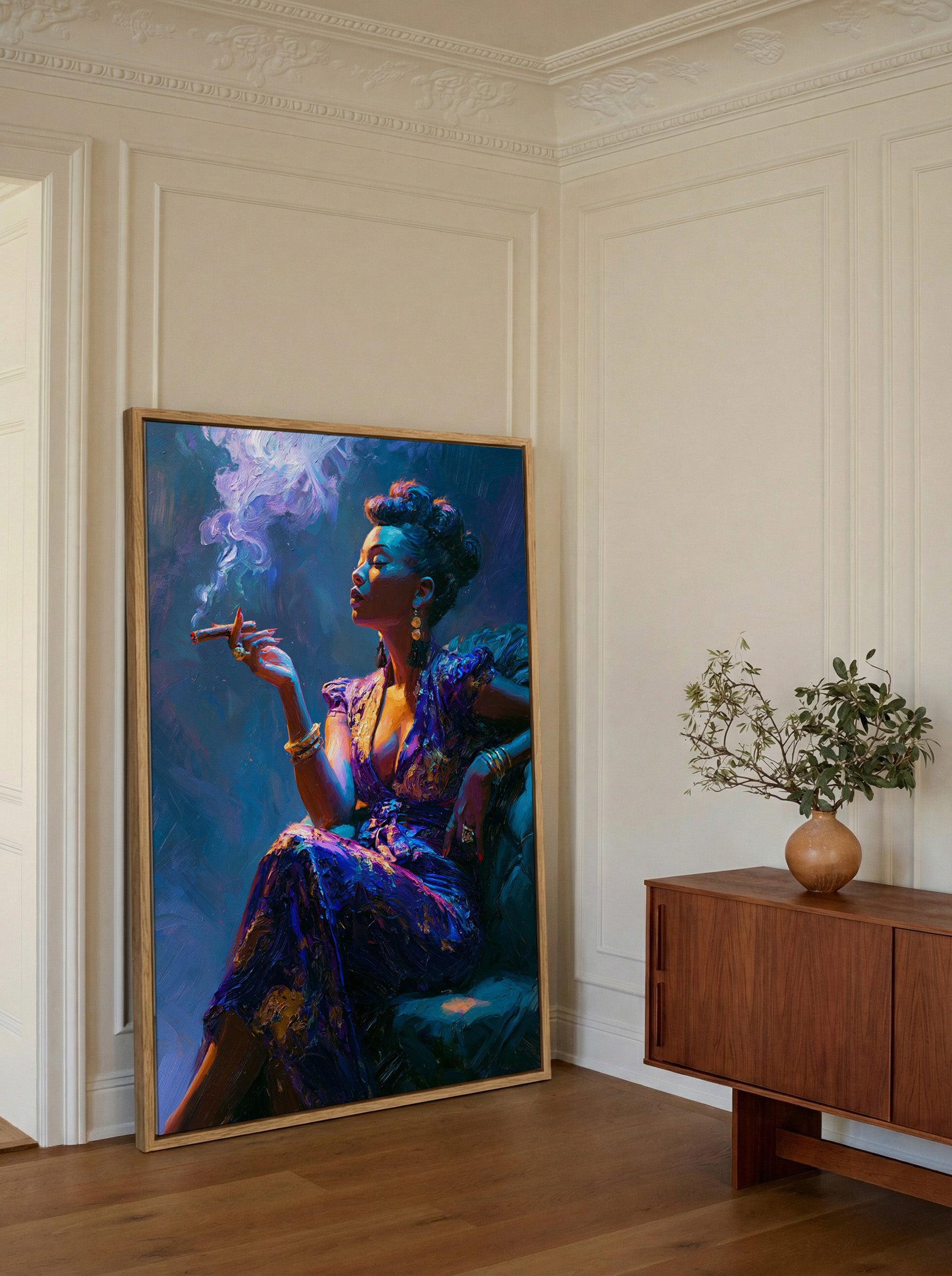 jewel toned portrait with blue light and smoke canvas wall art in an oak frame in a styled room setting