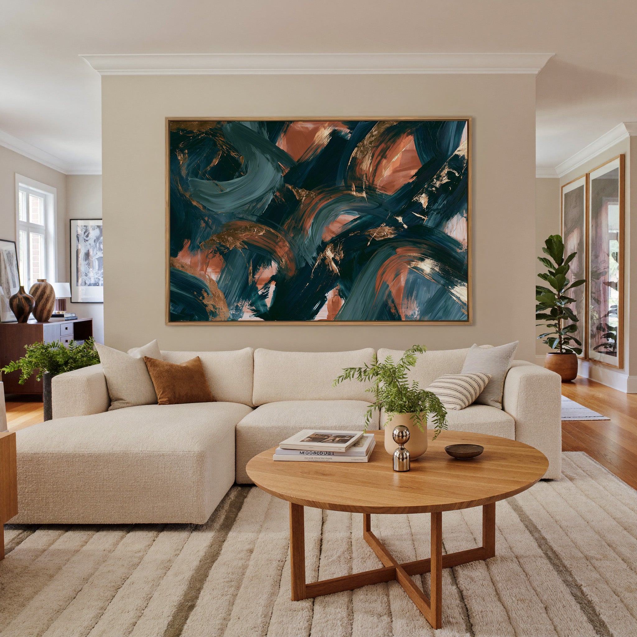 teal and copper abstract with sweeping arcs canvas wall art in an oak frame in a living room