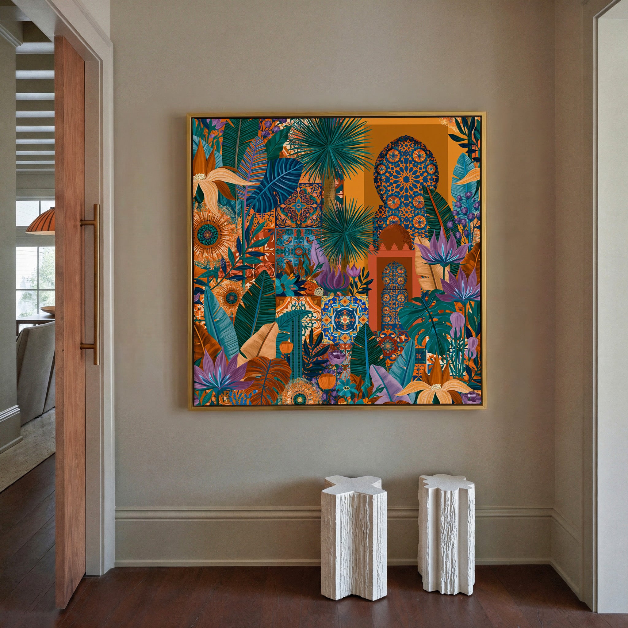 teal leaves with orange tile motifs canvas wall art in a gold frame in a styled room setting