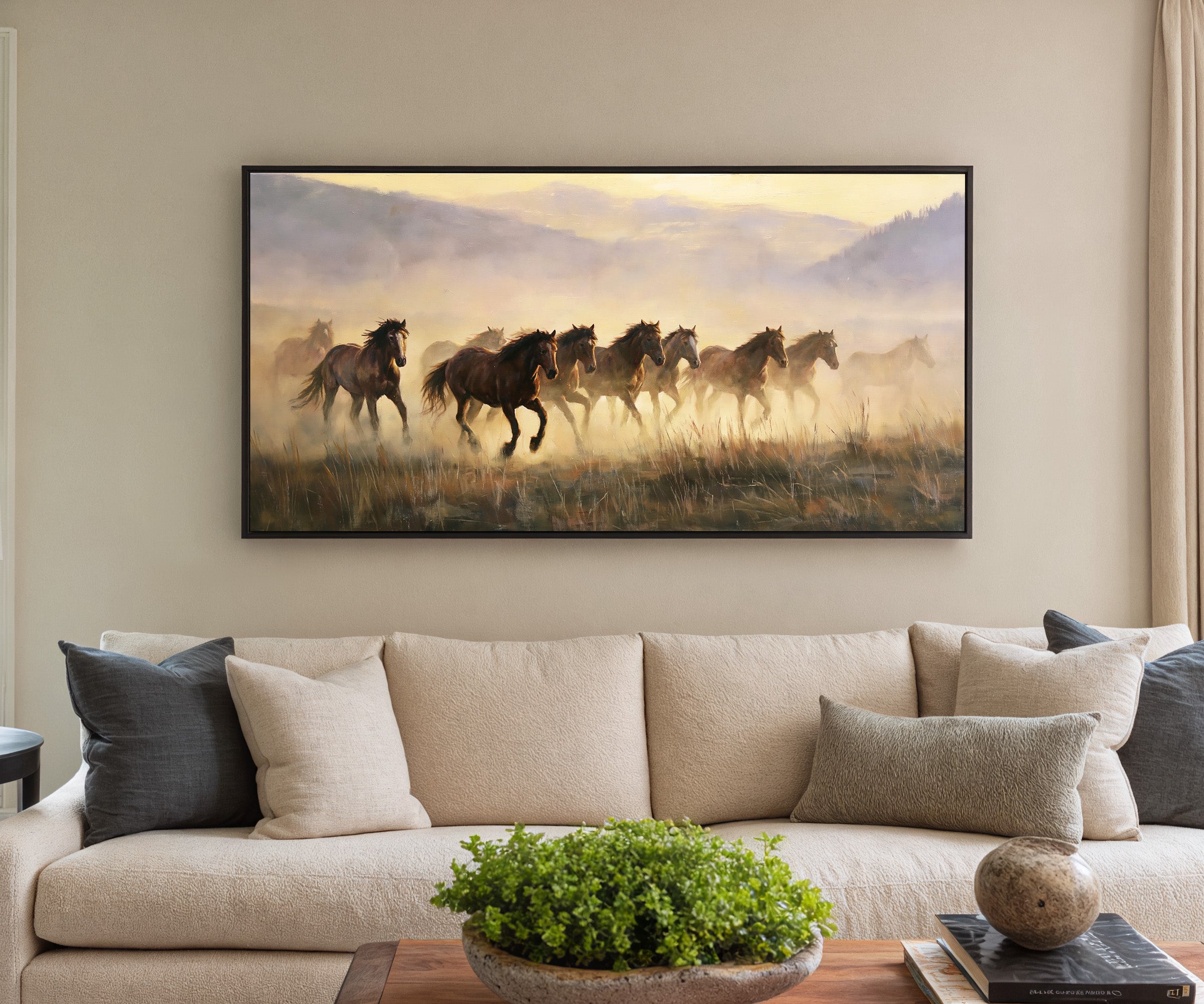 misty mustang herd at sunrise canvas wall art in a black frame in a styled room setting