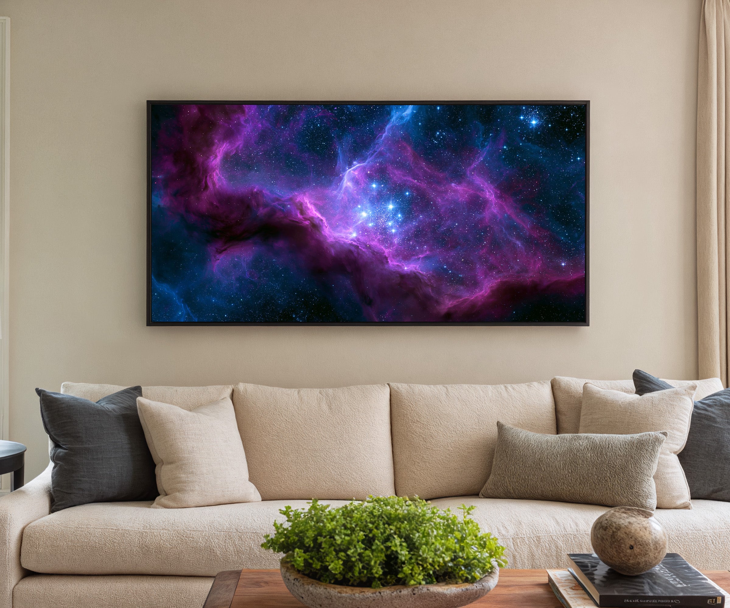 violet and blue nebula with bright star cluster canvas wall art in a black frame in a styled room setting