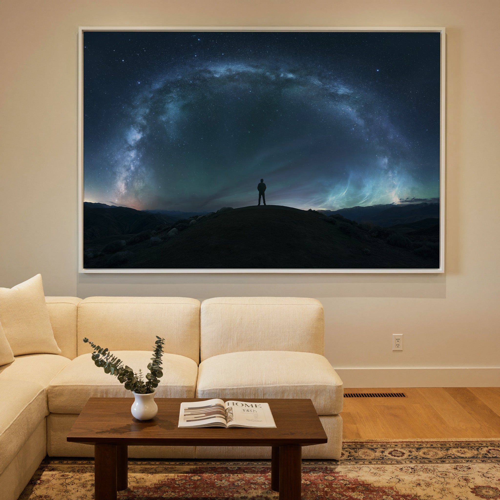 lone figure beneath a sweeping star arc canvas wall art in a white frame in a styled room setting
