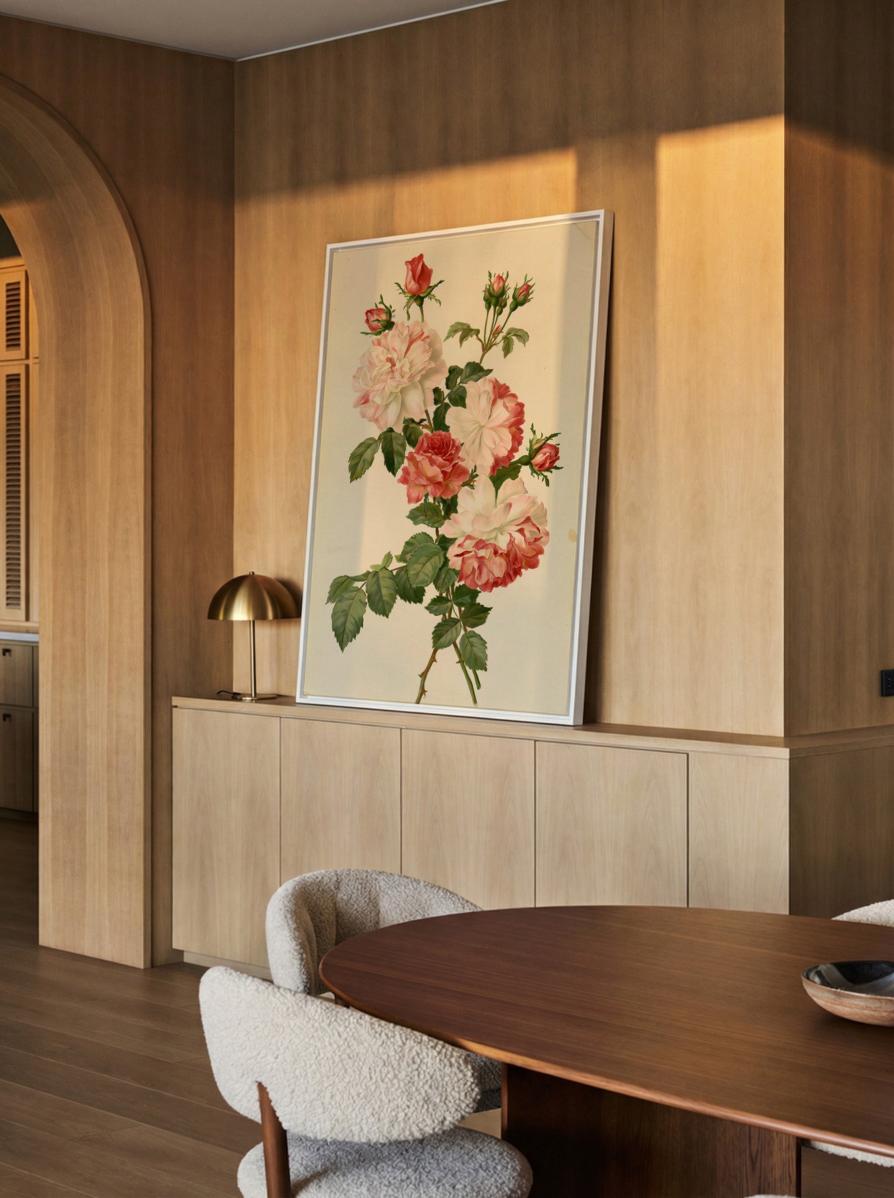 cream and pink rose botanical canvas wall art in a white frame in a styled room setting