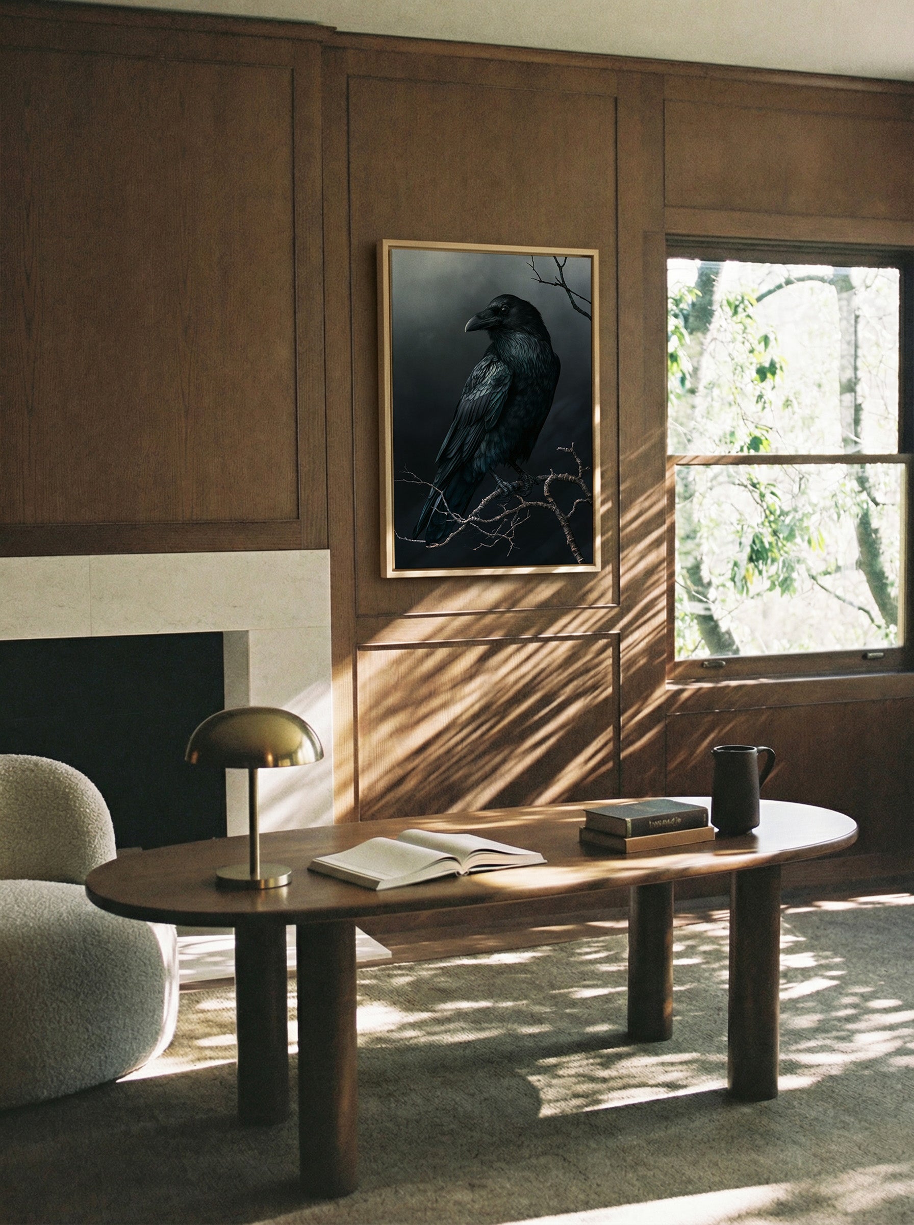 dark raven on bare winter branch canvas wall art in a natural wood frame in a styled room setting