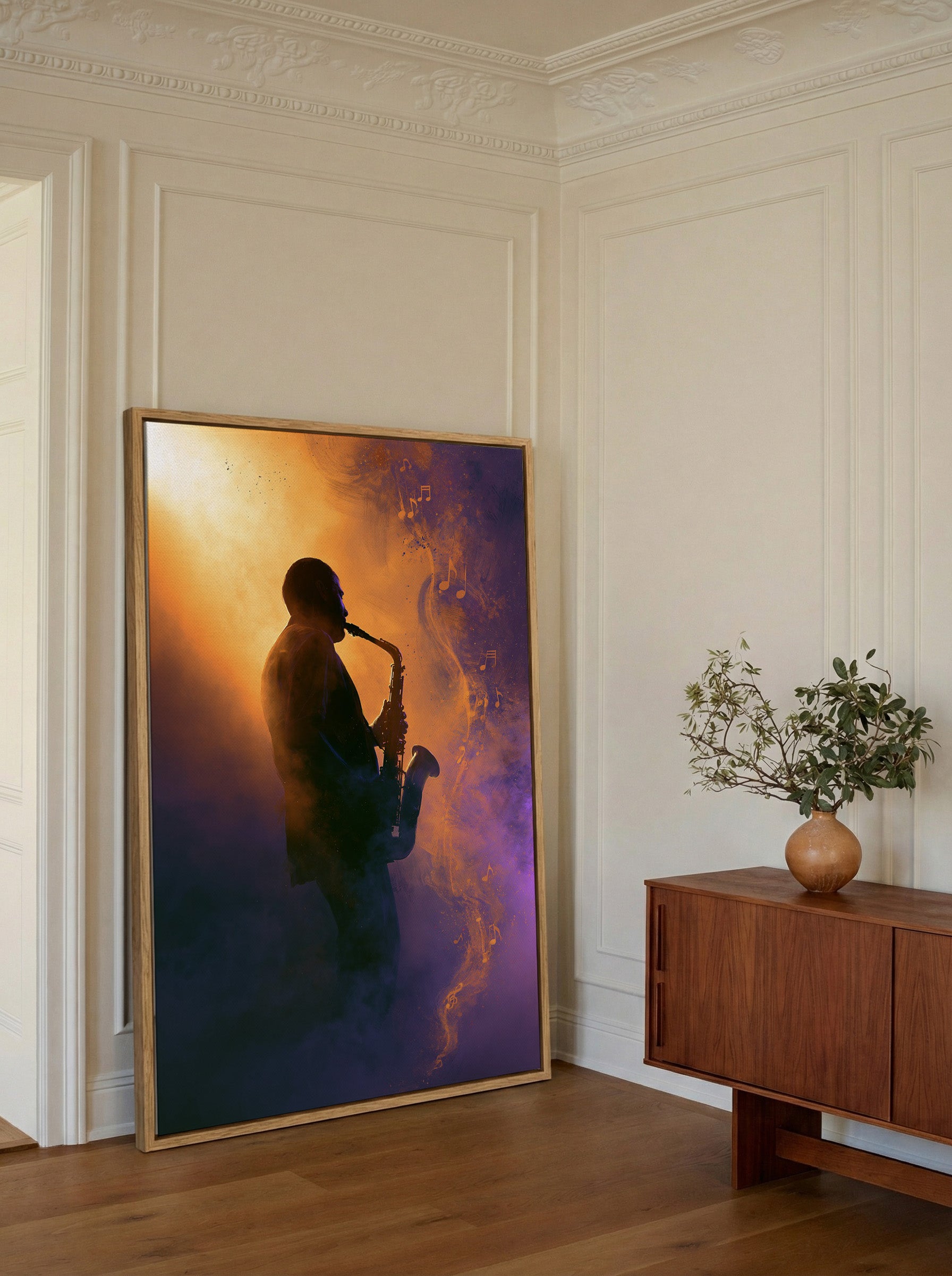 silhouetted saxophone player in orange and canvas wall art in an oak frame in a styled room setting