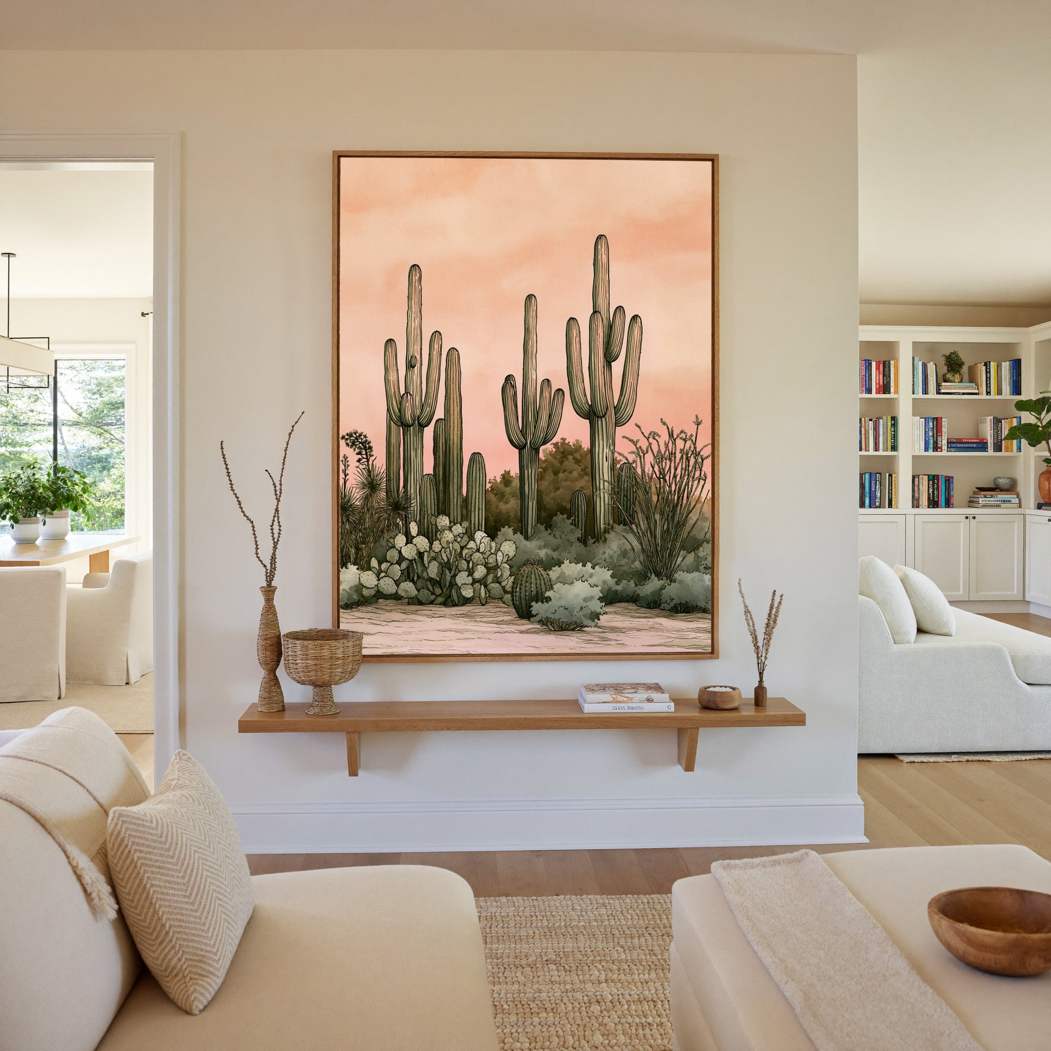 pink dusk desert cactus garden canvas wall art in an oak frame in a living room