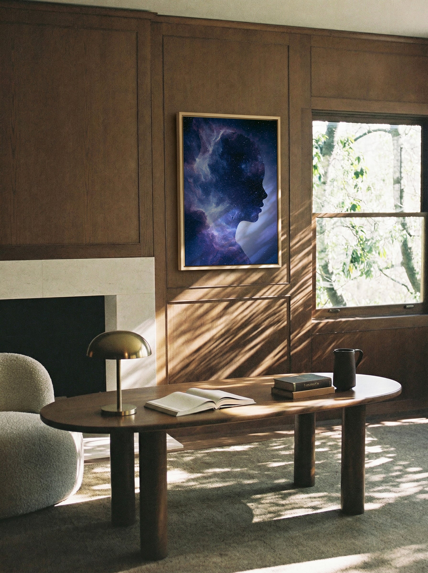 woman silhouette filled with canvas wall art in a natural wood frame in a styled room setting