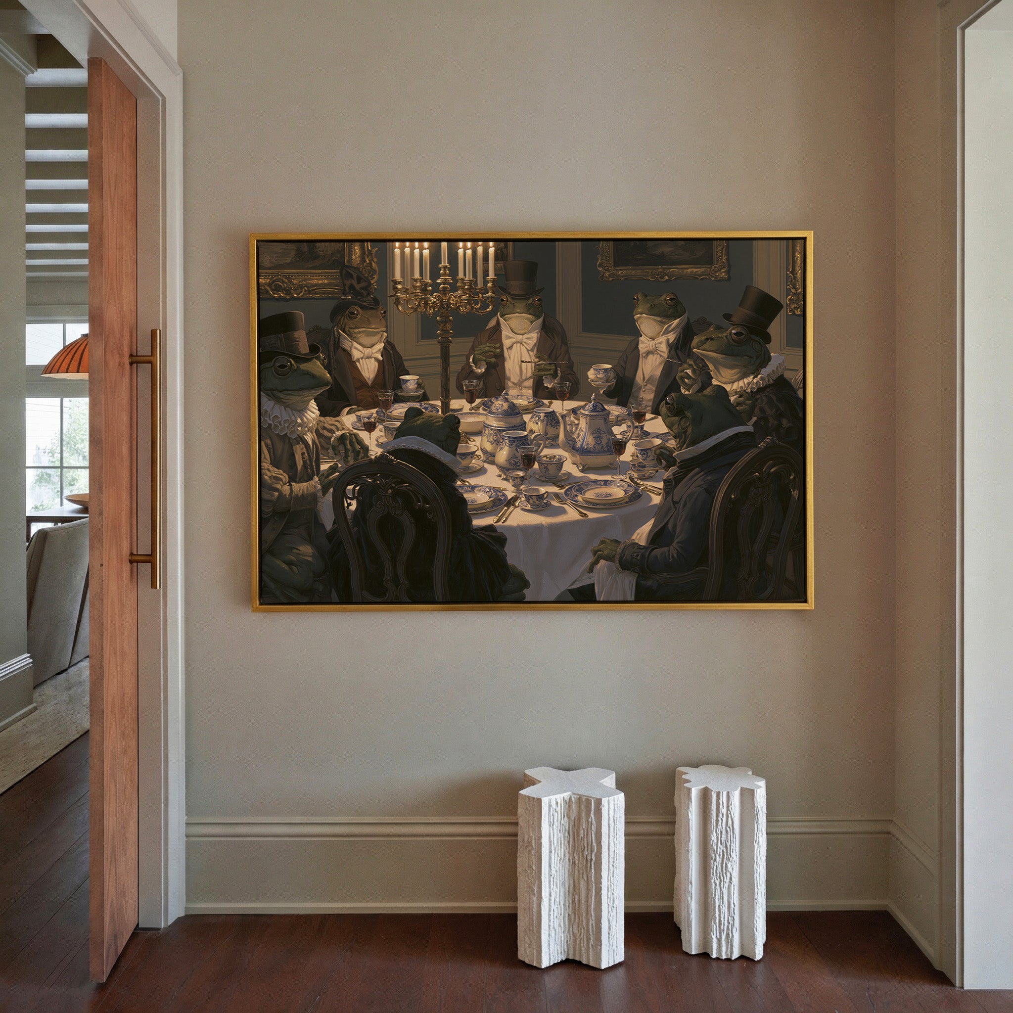 formal frogs around a candlelit table canvas wall art in a gold frame in a styled room setting