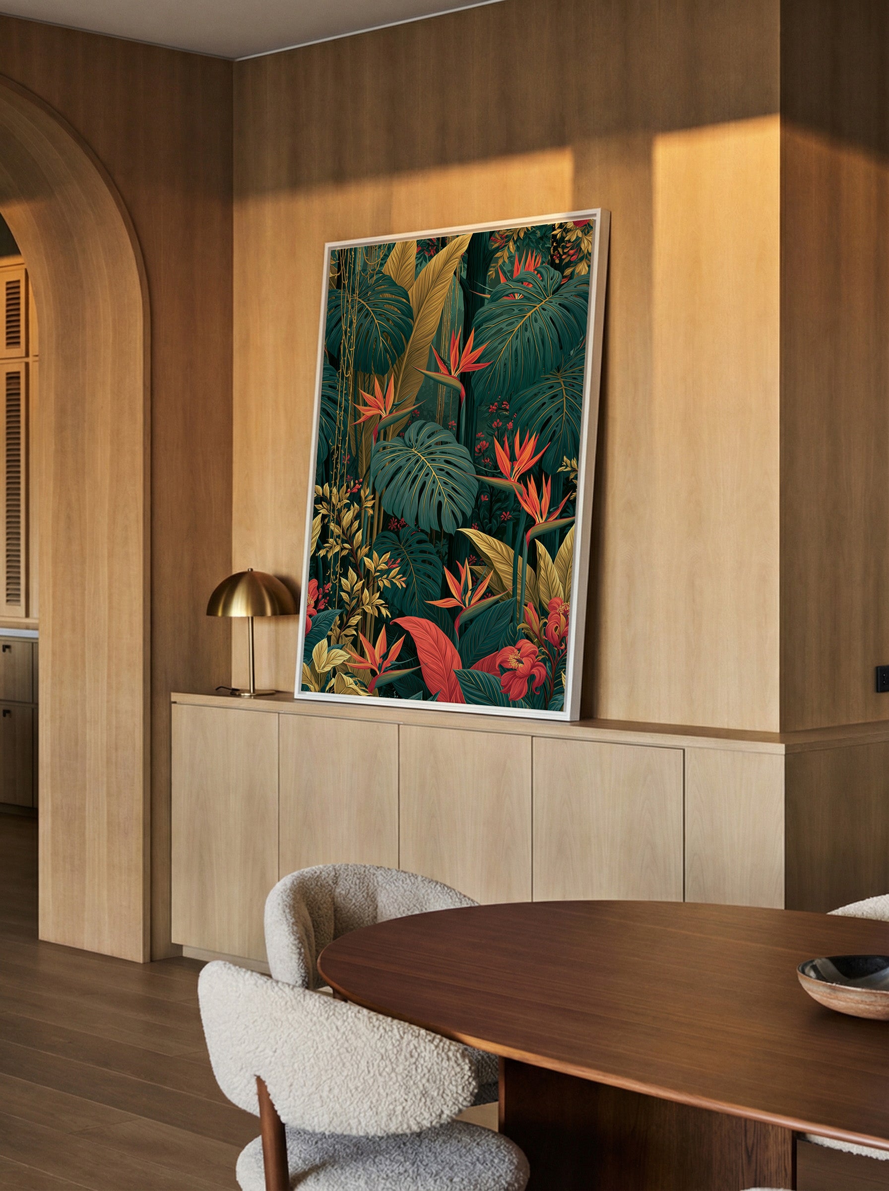 lush tropical jungle with giant monstera leaves canvas wall art in a white frame in a styled room setting