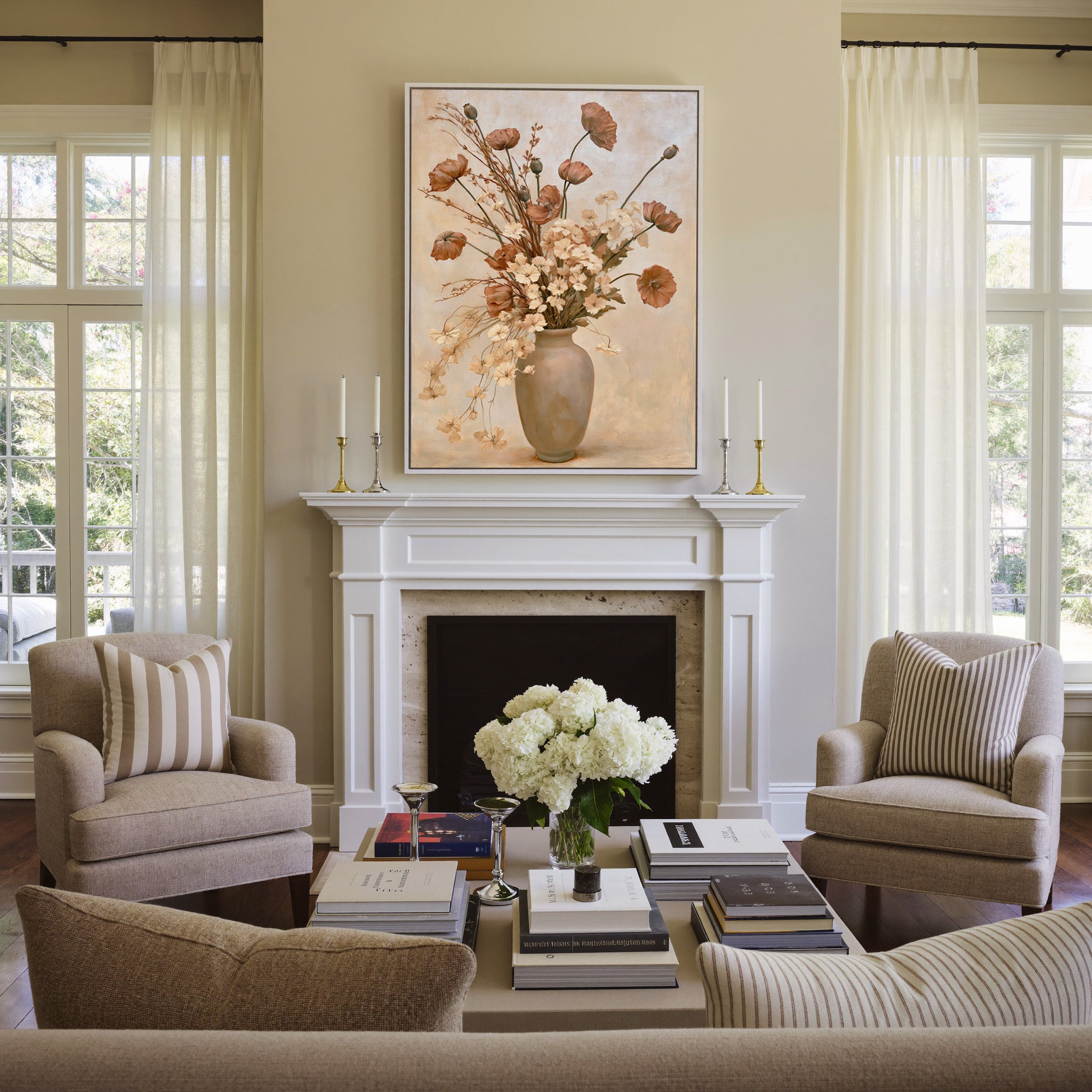 cream vase with dried poppies and pale blossoms canvas wall art in a white frame above a mantel