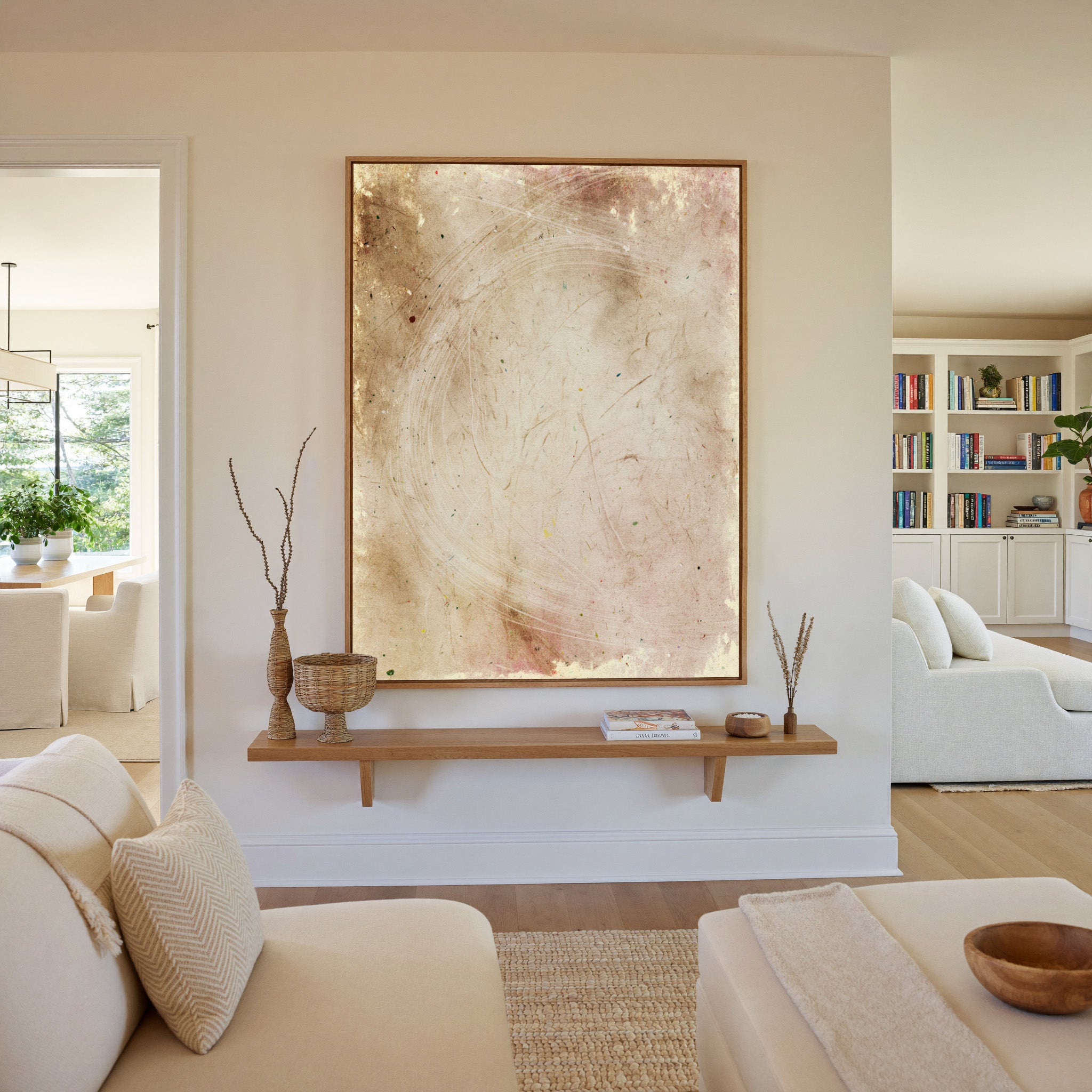 warm beige abstract with pale curved lines canvas wall art in an oak frame in a living room