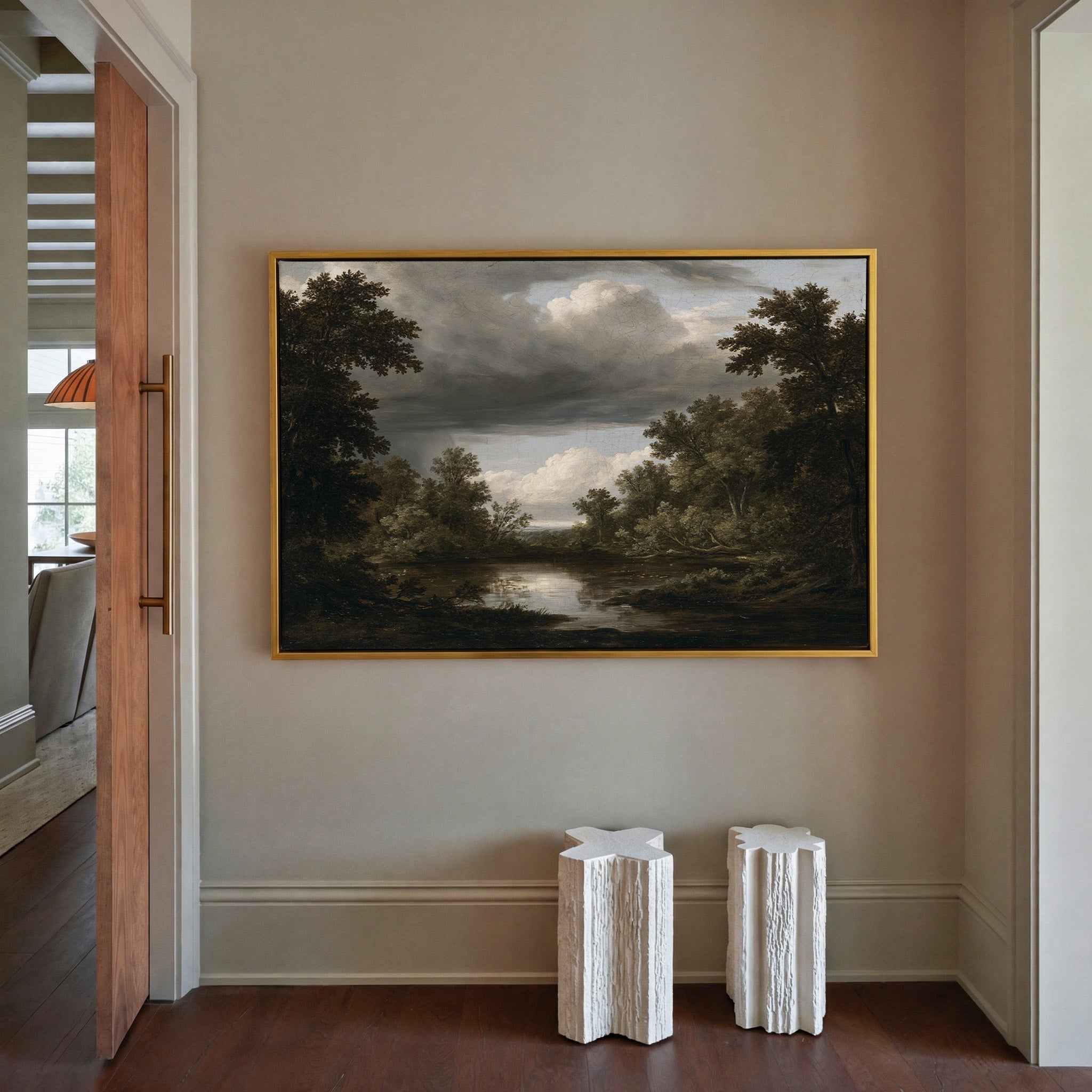 dark woodland pool under heavy storm clouds canvas wall art in a gold frame in a styled room setting