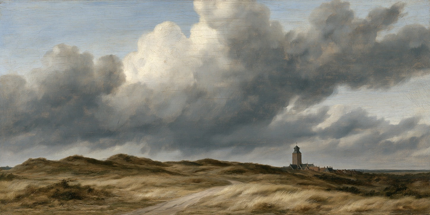 Low sand dunes and a distant tower beneath huge gray wind-driven clouds