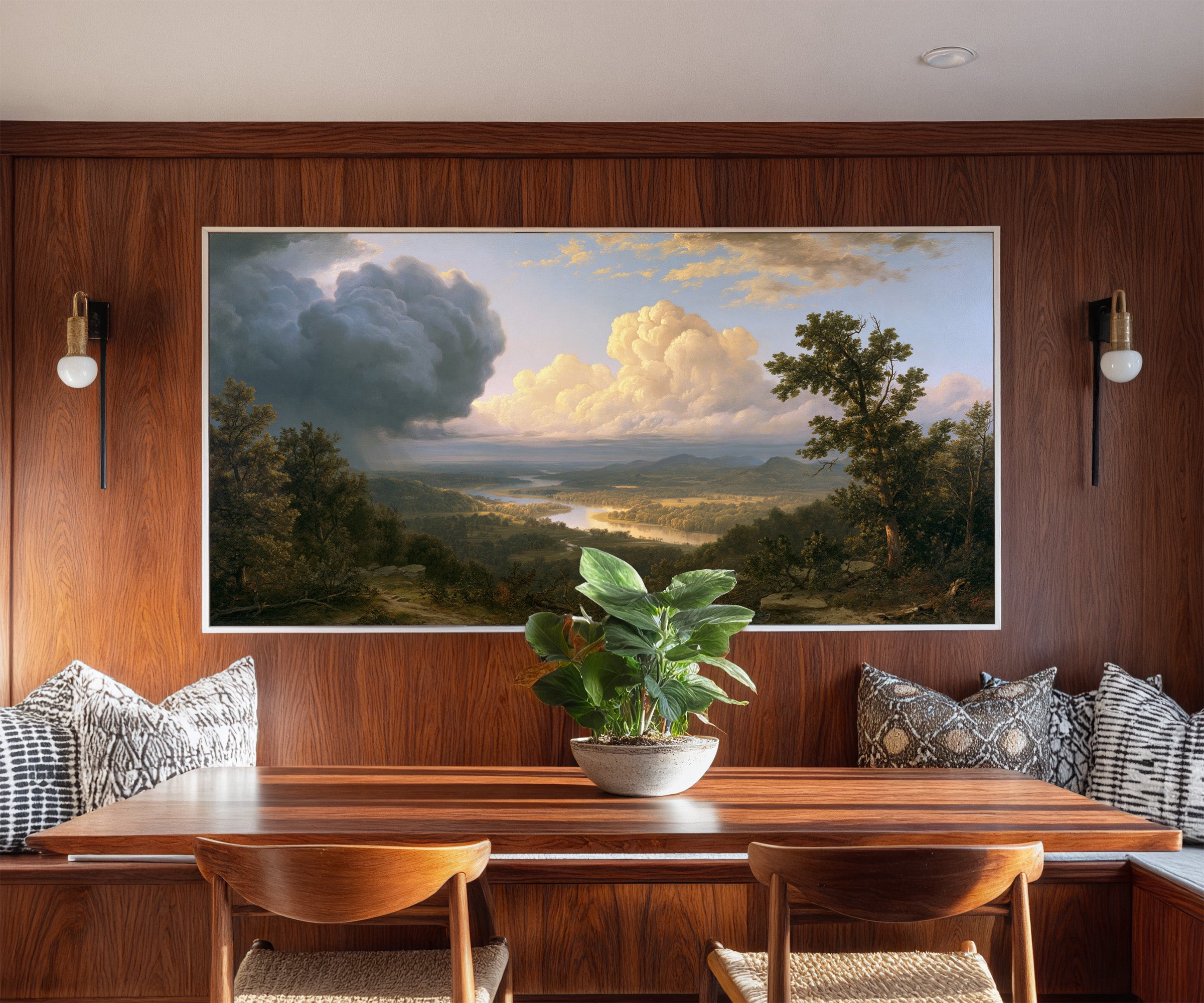 wide river valley with towering clouds canvas wall art in a white frame in a styled room setting