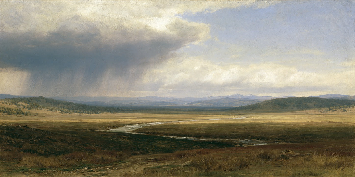 Wide plain beneath split storm sky, with dark cloud shadow left and pale light right