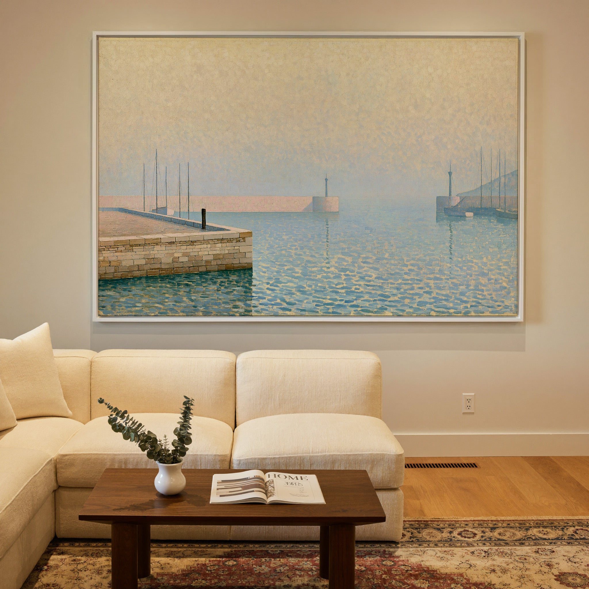 pale geometric harbor with stone pier and soft canvas wall art in a white frame in a styled room setting