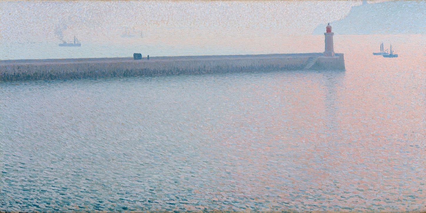 Long harbor wall with a lighthouse, pale pink water, and two small boats at dawn