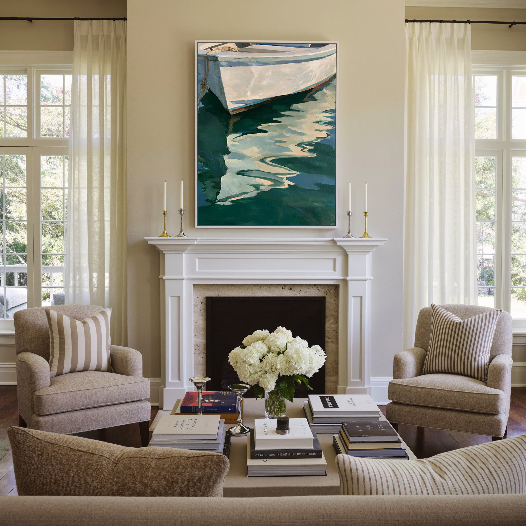 white boat hull over deep green water canvas wall art in a white frame above a mantel