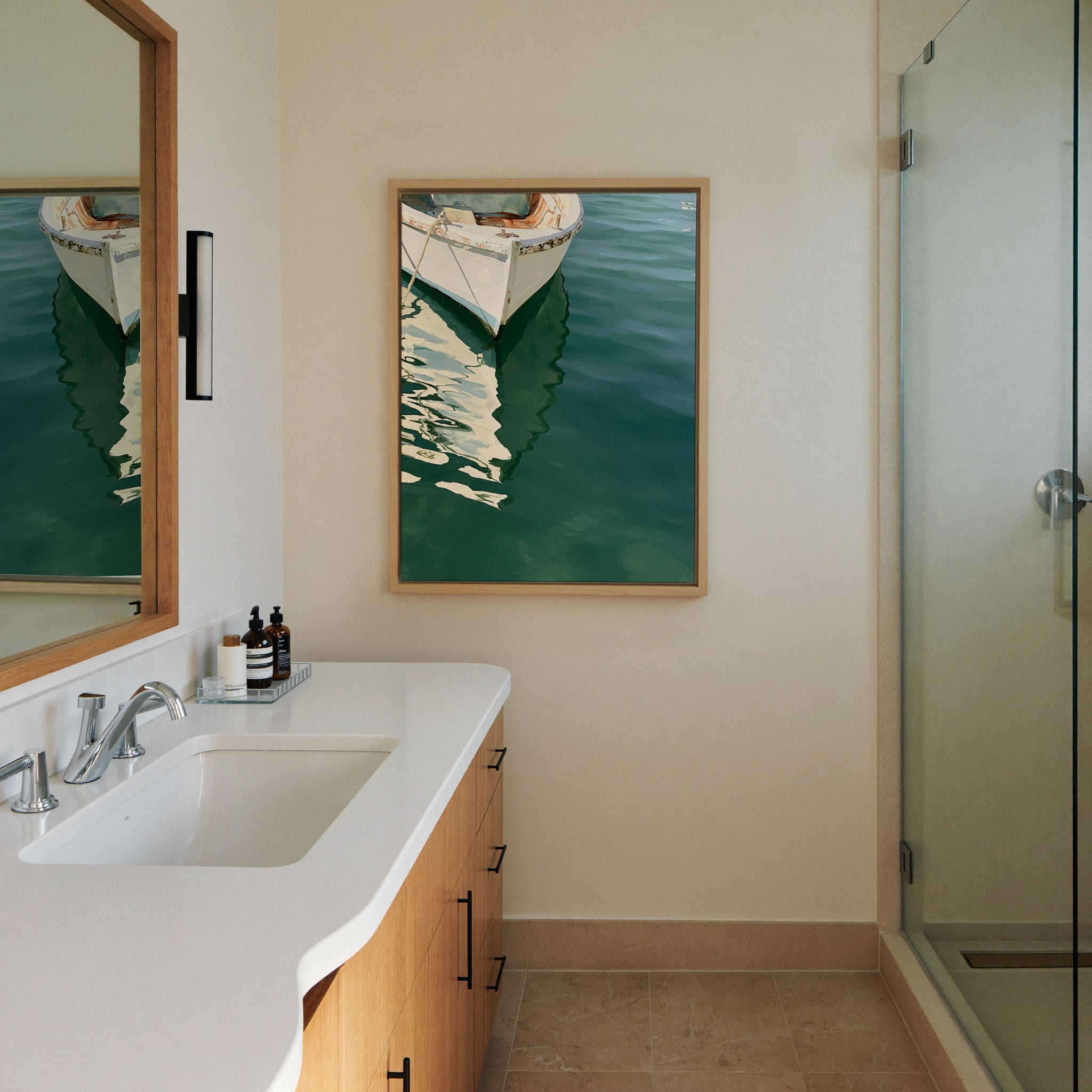 cropped white bow over deep green water canvas wall art in a natural wood frame in a styled room setting