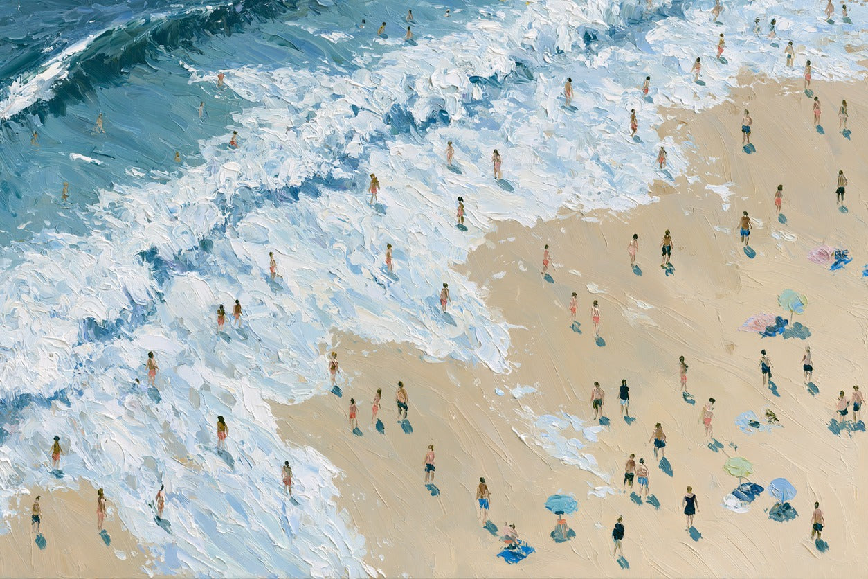 Diagonal surf and pale sand with small figures, blue shadows, and scattered umbrellas