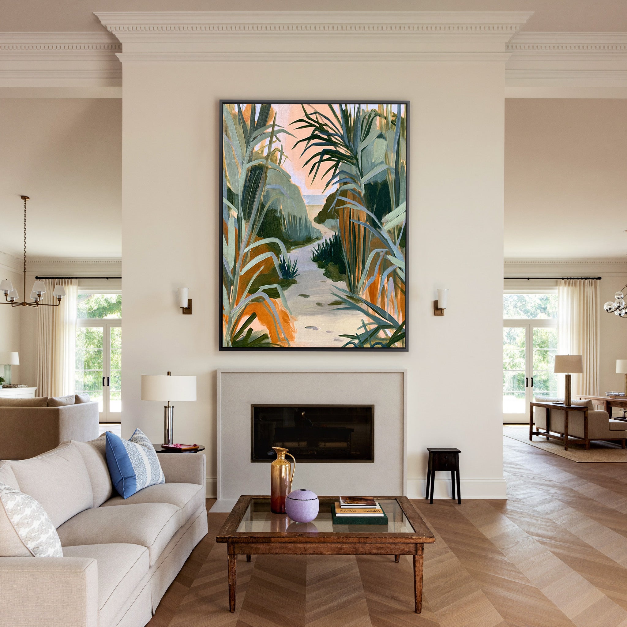 sandy path between tall coastal grasses canvas wall art in a black frame above a mantel