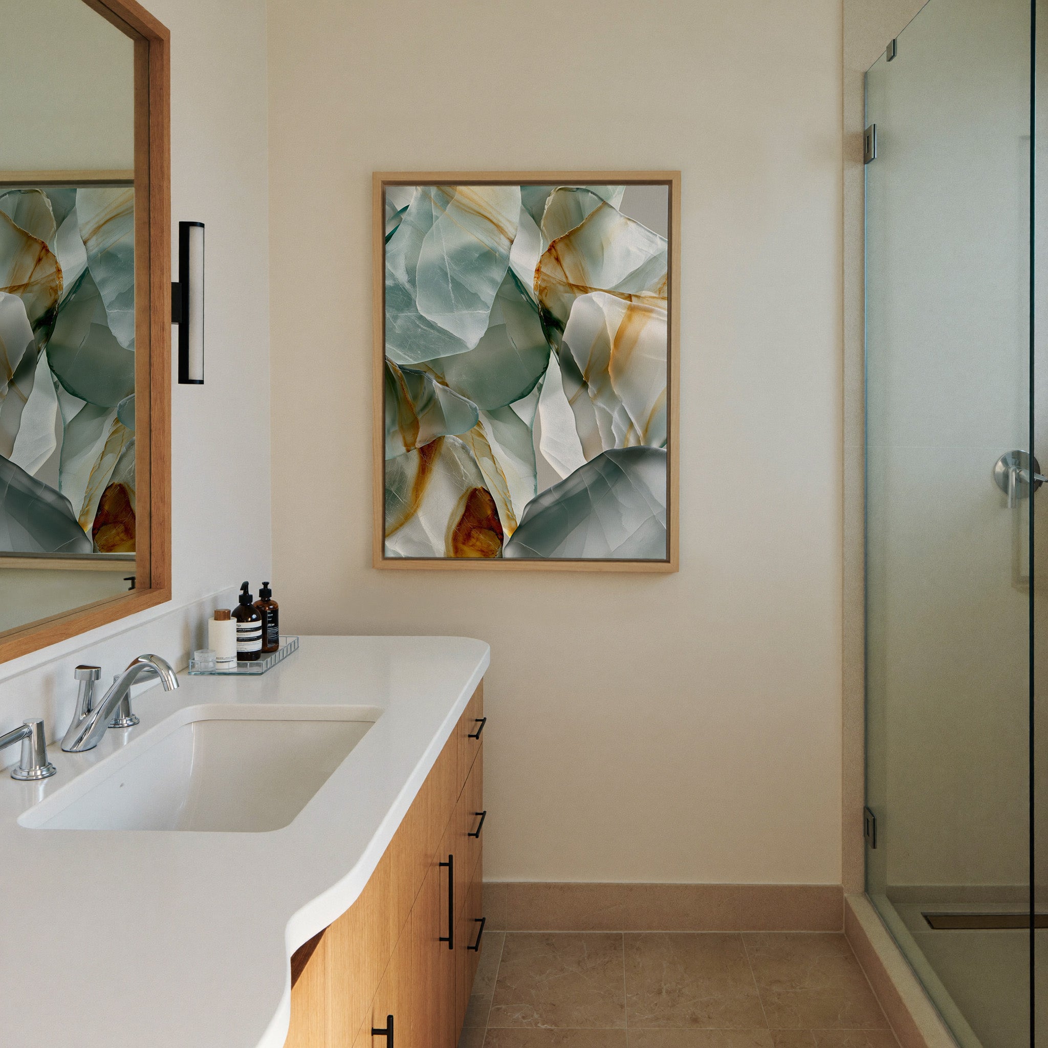 soft sea glass abstract with pale canvas wall art in a natural wood frame in a styled room setting