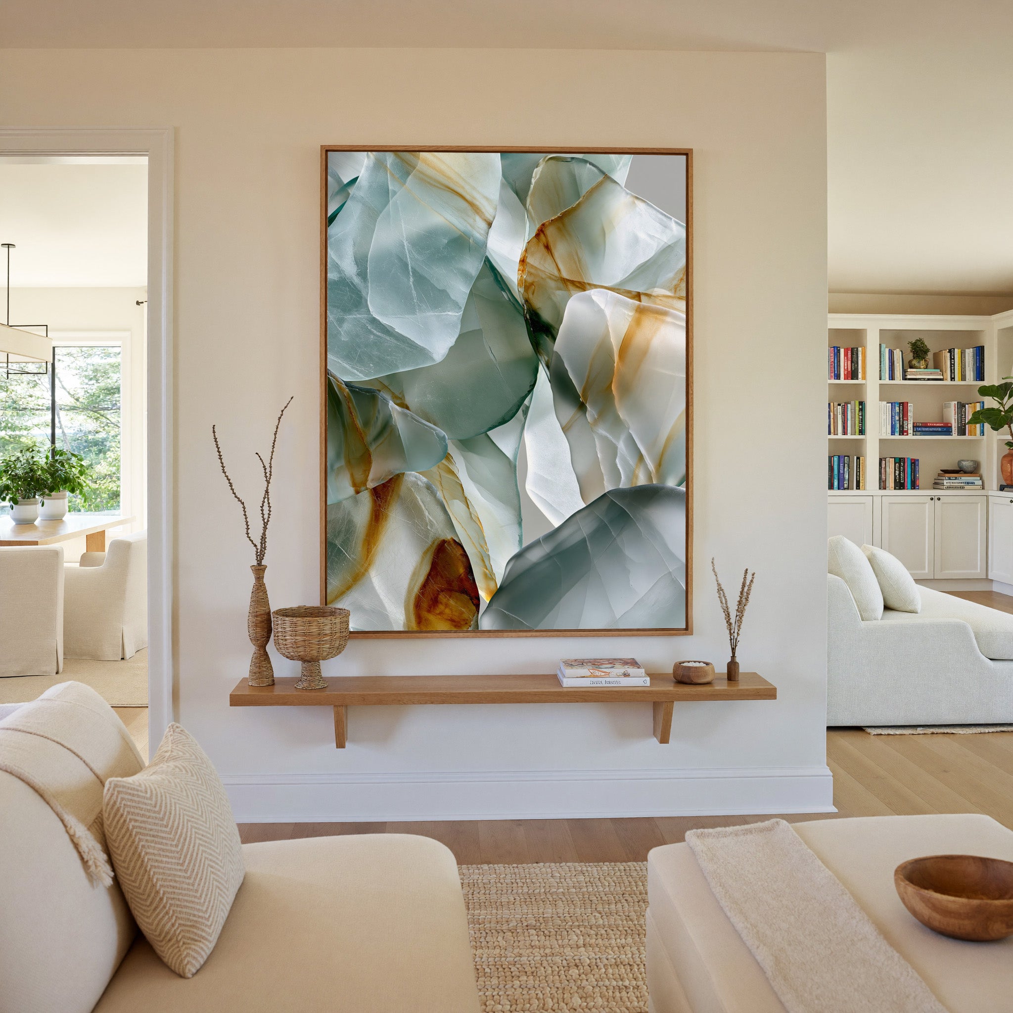 soft sea glass abstract with pale aqua, white, canvas wall art in an oak frame in a living room